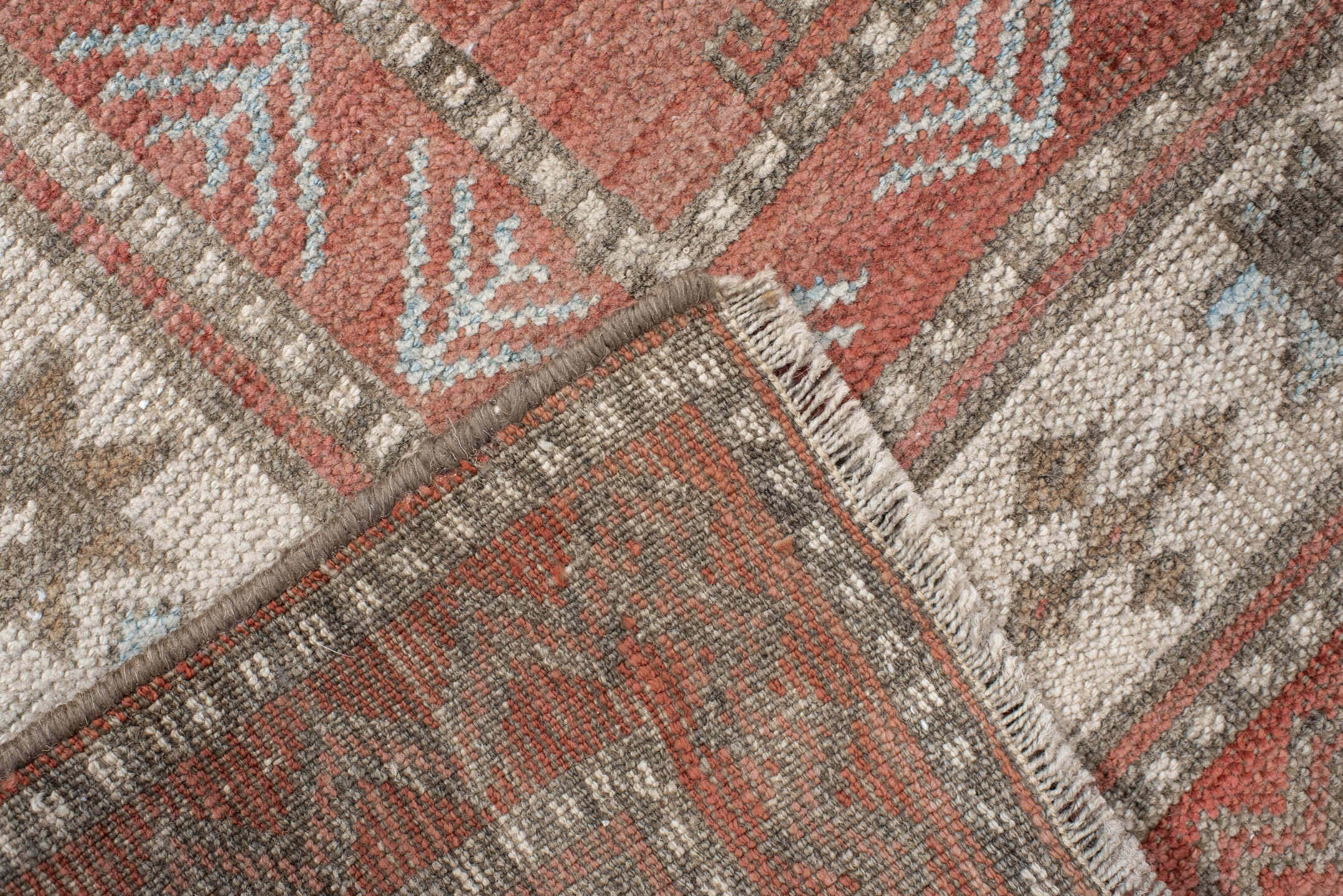 3' x 7' one-of-a-kind handmade antique Belouch runner rug. Color palette: terra cotta, ivory, taupe, brown, slate, rust