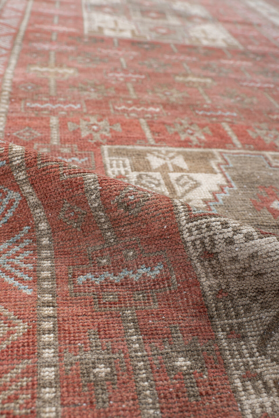 3' x 7' one-of-a-kind handmade antique Belouch runner rug. Color palette: terra cotta, ivory, taupe, brown, slate, rust