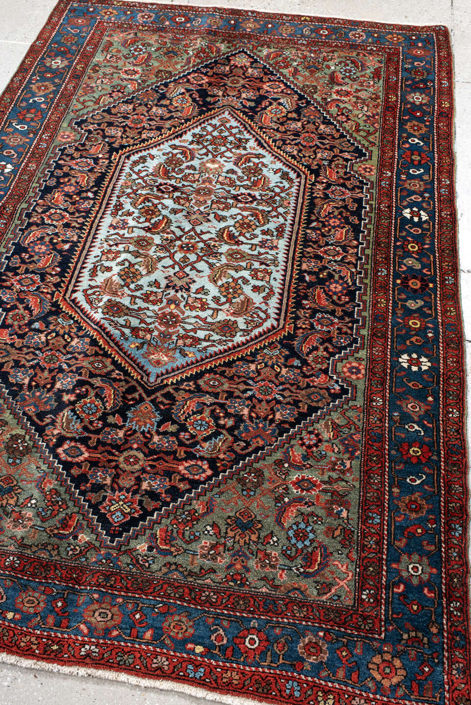 4' x 6' one-of-a-kind handmade vintage Sarouk small size rug. Color palette: navy, cobalt, rust, light blue, sage, ivory
