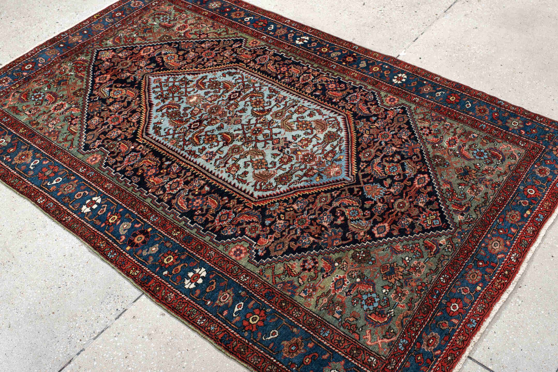 4' x 6' one-of-a-kind handmade vintage Sarouk small size rug. Color palette: navy, cobalt, rust, light blue, sage, ivory