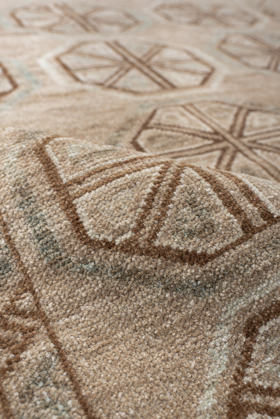 3' x 6' one-of-a-kind handmade antique Belouch rug. Color palette: ivory, camel, taupe, brown, pale blue, beige, gray