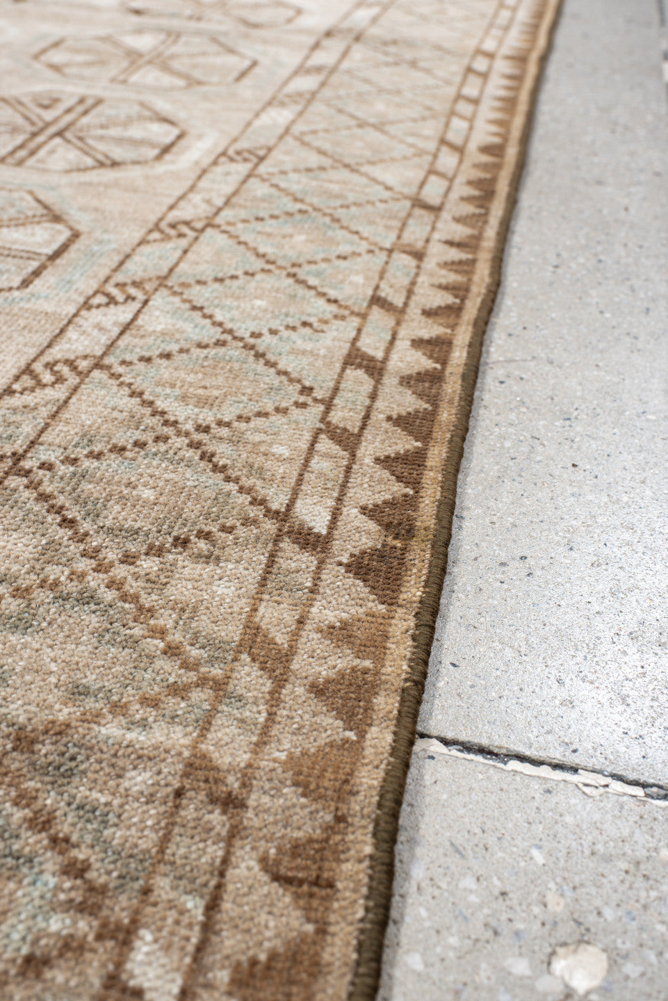3' x 6' one-of-a-kind handmade antique Belouch rug. Color palette: ivory, camel, taupe, brown, pale blue, beige, gray
