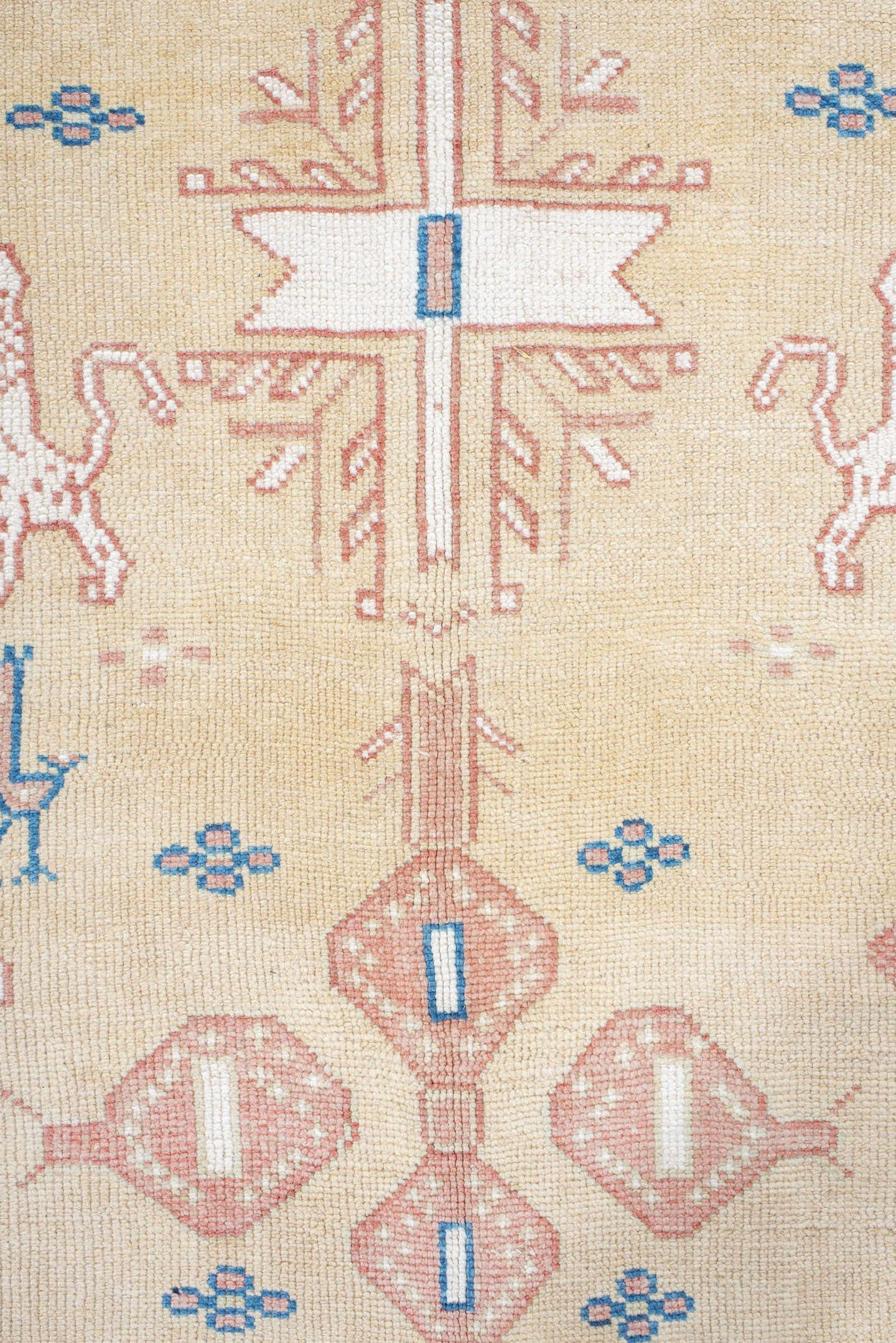 4' x 9' one-of-a-kind handmade antique Moroccan rug. Color palette: ivory, rose, blue, navy, cream, taupe, pink, red, beige