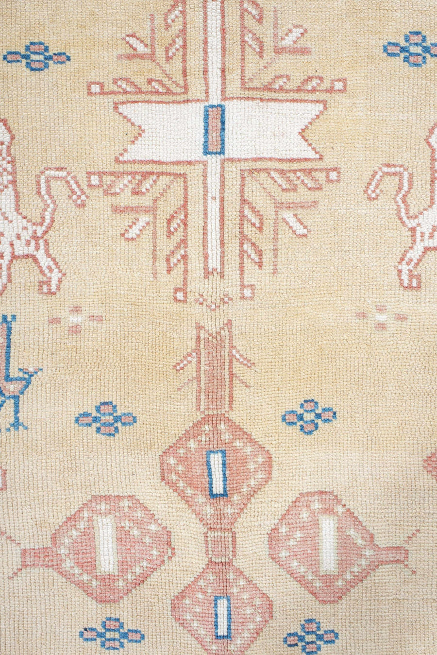 4' x 9' one-of-a-kind handmade antique Moroccan rug. Color palette: ivory, rose, blue, navy, cream, taupe, pink, red, beige