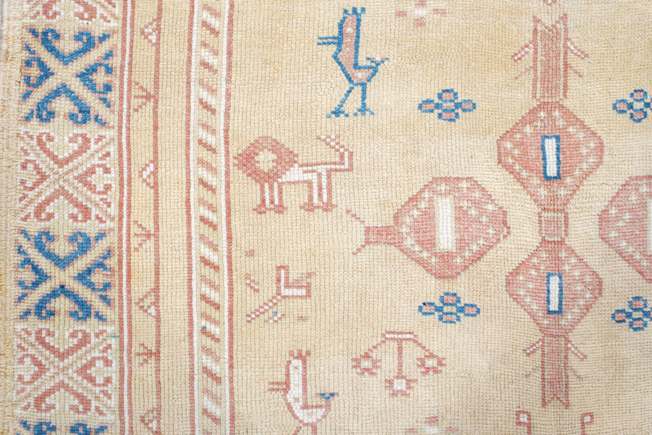 4' x 9' one-of-a-kind handmade antique Moroccan rug. Color palette: ivory, rose, blue, navy, cream, taupe, pink, red, beige