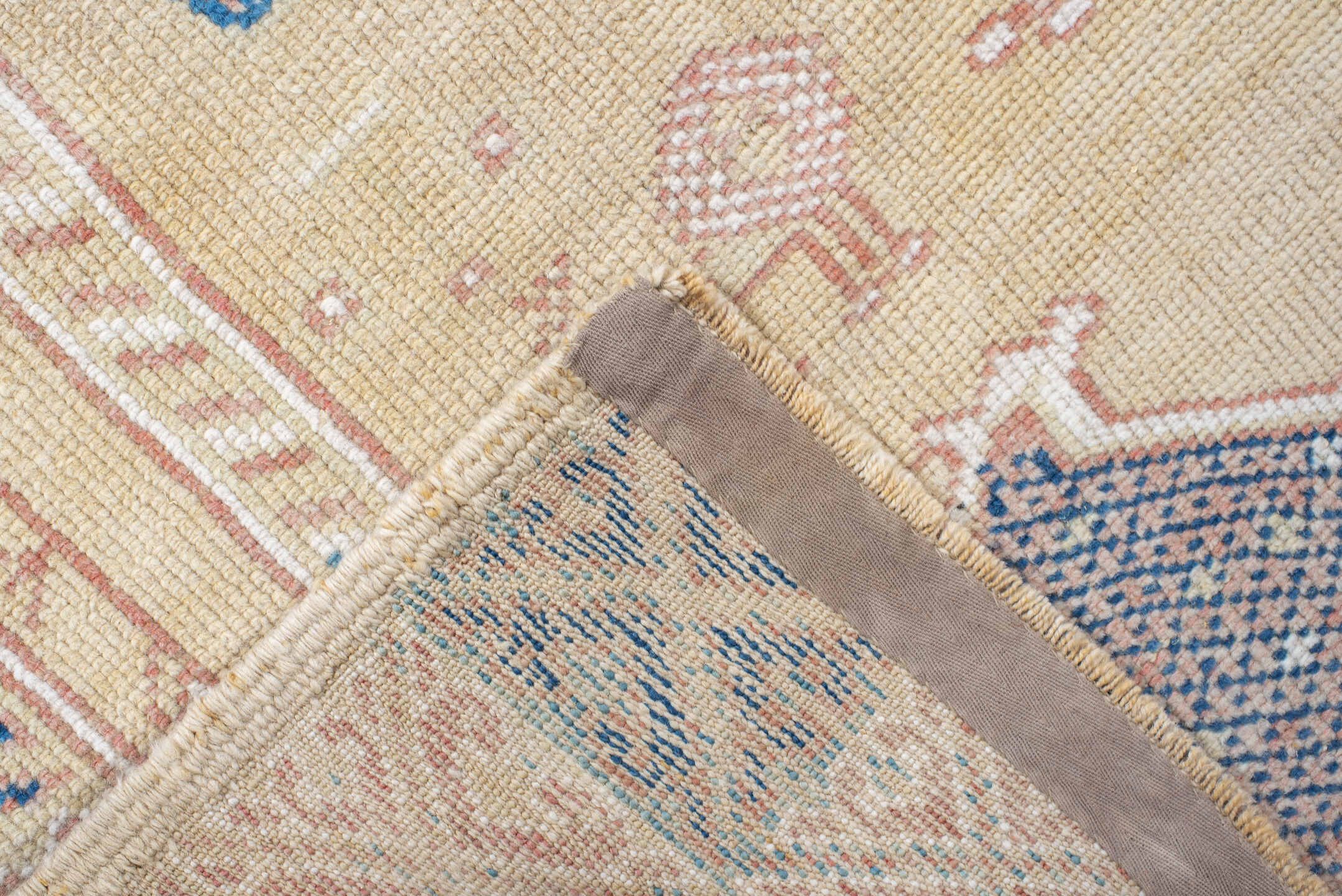 4' x 9' one-of-a-kind handmade antique Moroccan rug. Color palette: ivory, rose, blue, navy, cream, taupe, pink, red, beige