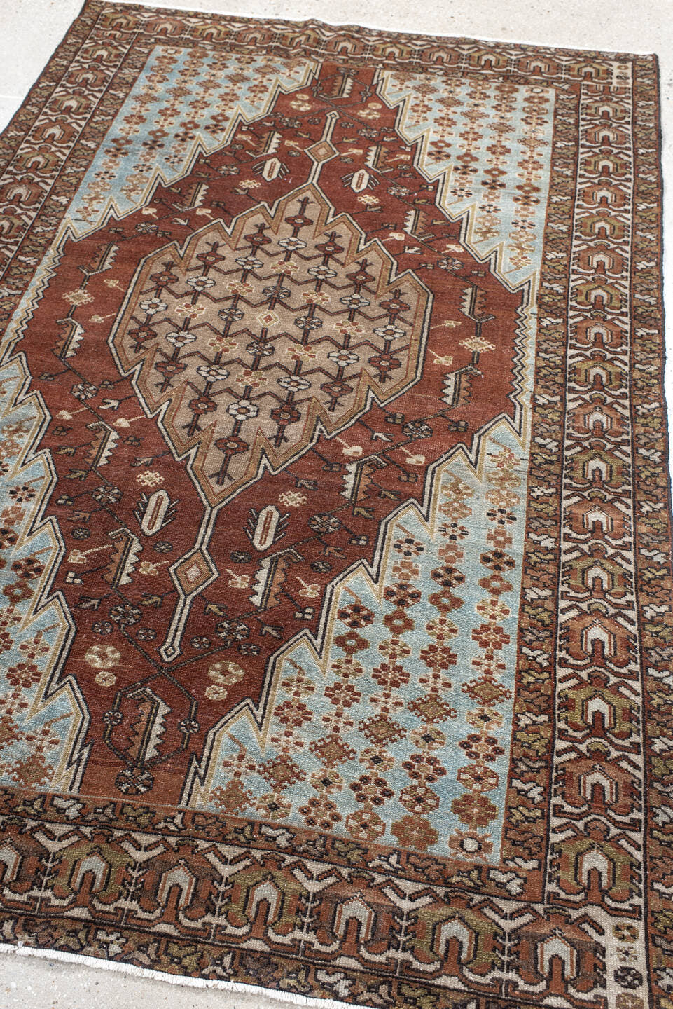 4' x 6' one-of-a-kind handmade vintage Malayer small size rug. Color palette: rust, ivory, light blue, brown, taupe
