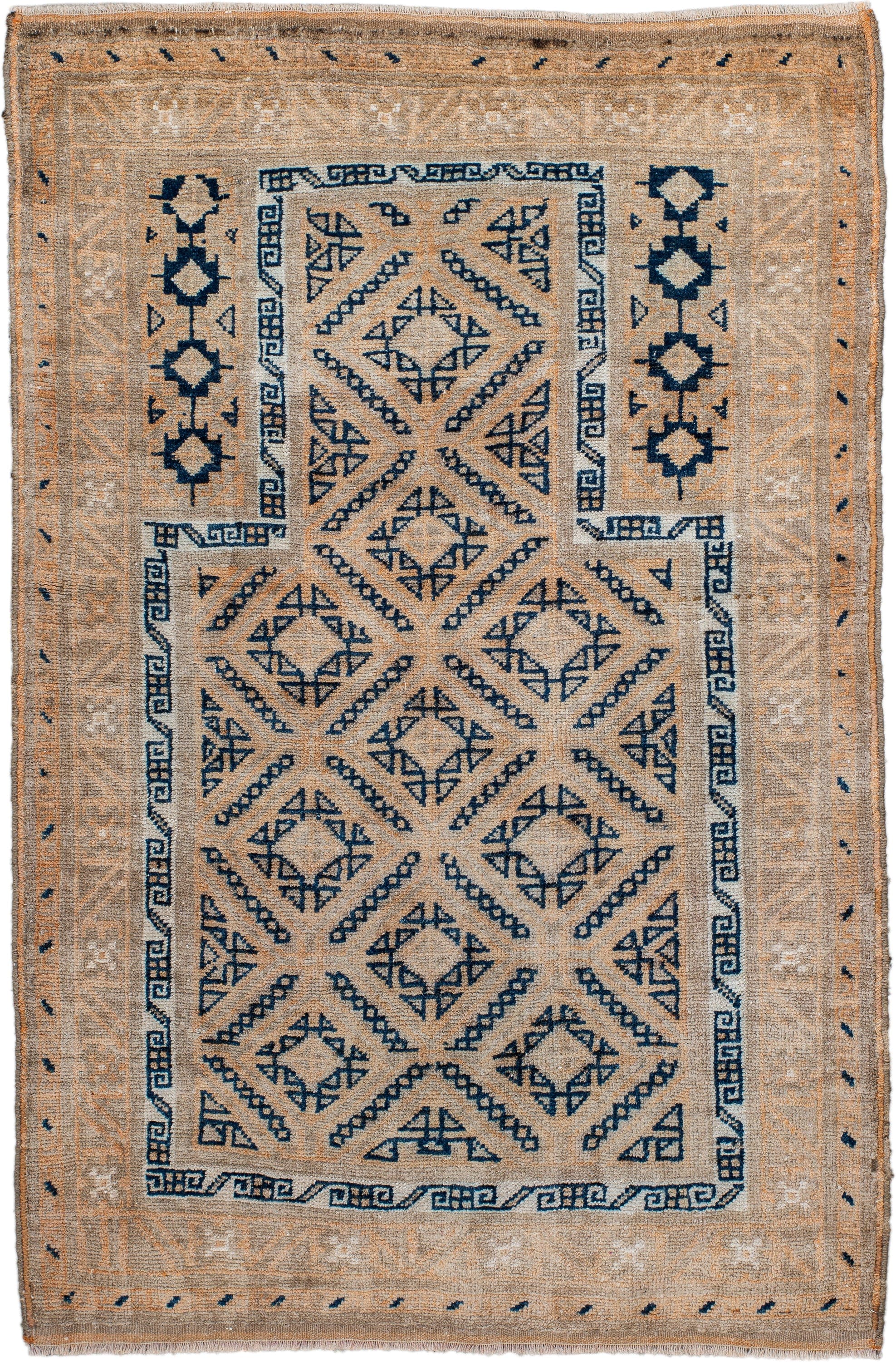 3' x 5' one-of-a-kind handmade antique Belouch small size rug. Color palette: camel, indigo, ivory, taupe, sand, beige