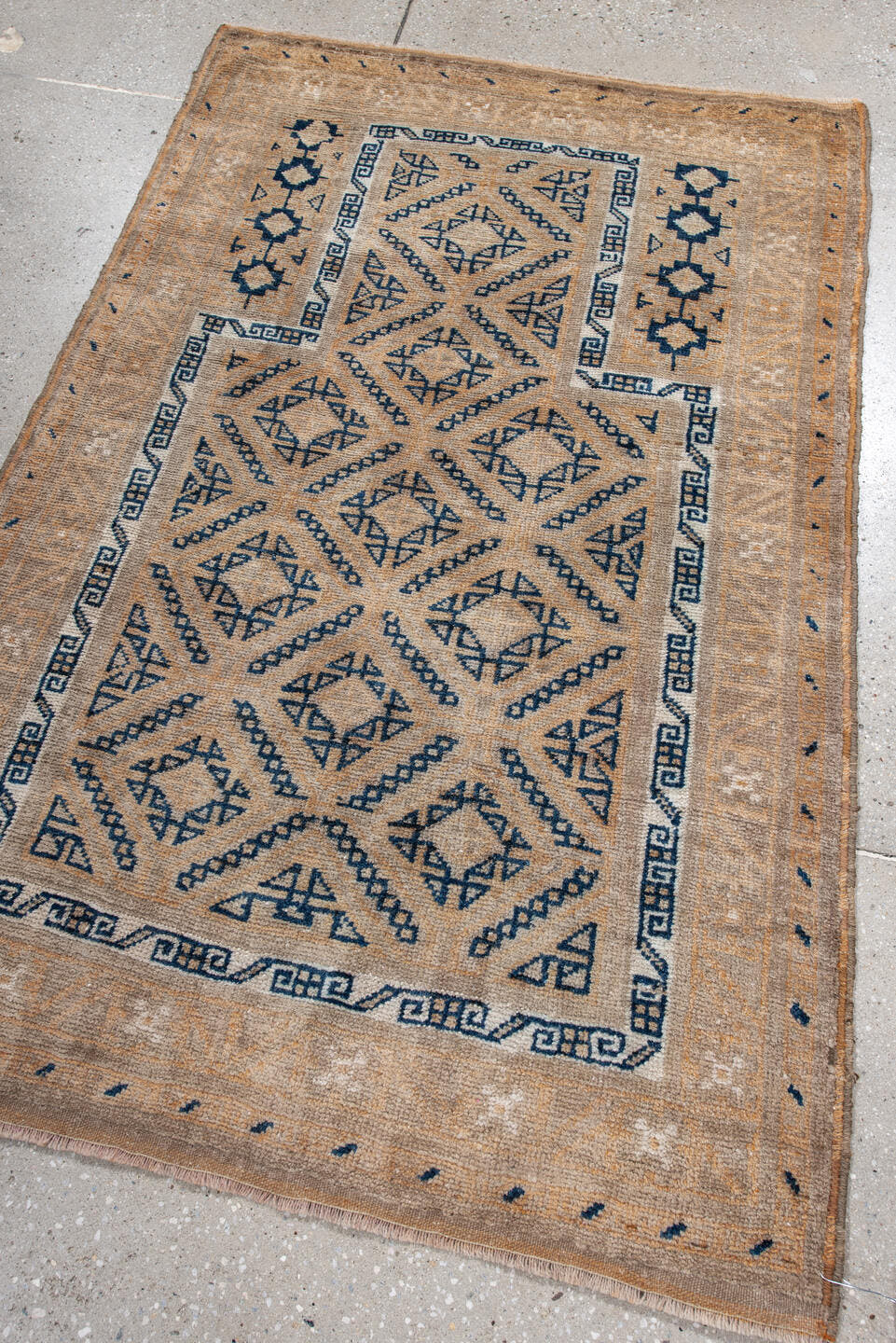 3' x 5' one-of-a-kind handmade antique Belouch small size rug. Color palette: camel, indigo, ivory, taupe, sand, beige