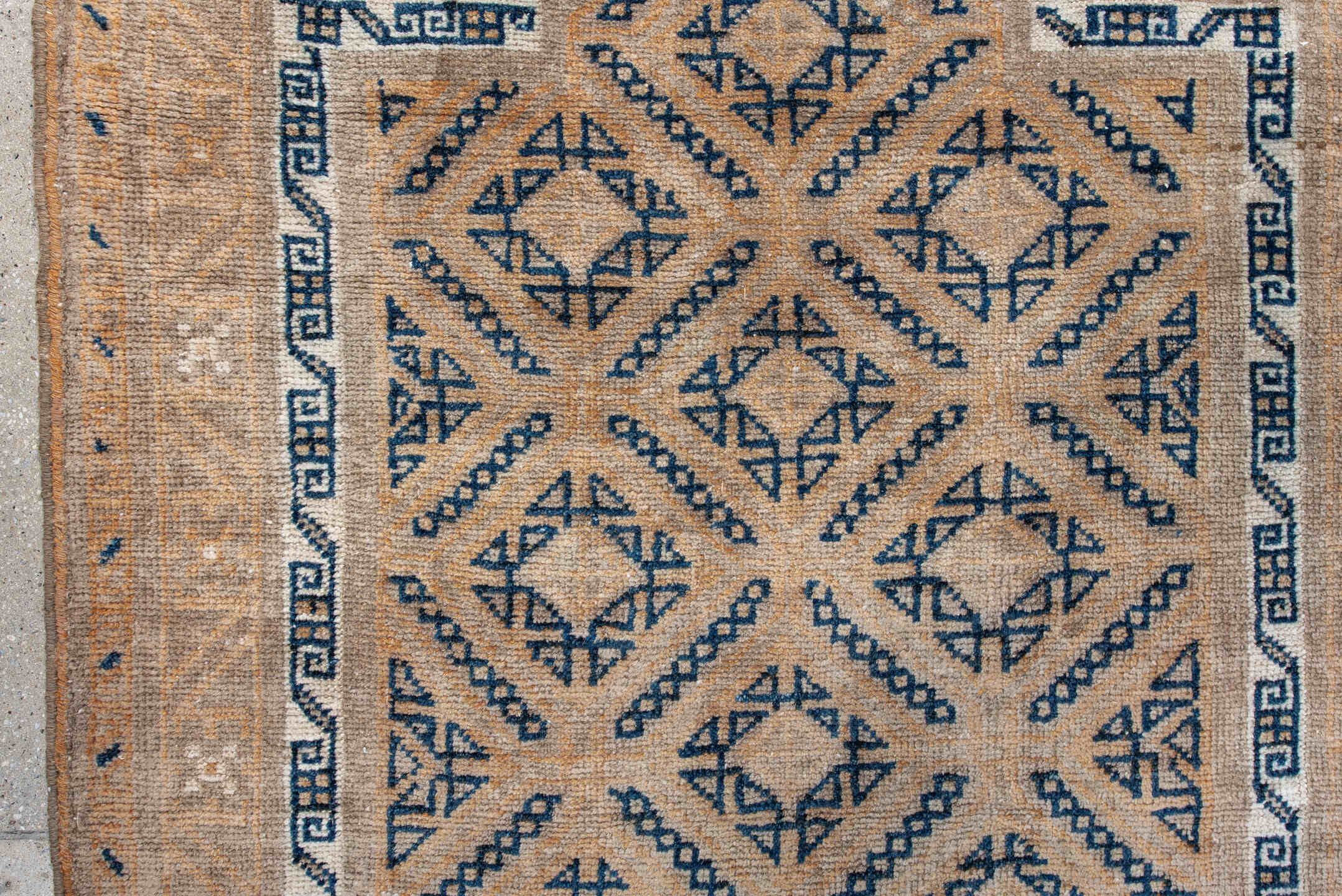 3' x 5' one-of-a-kind handmade antique Belouch small size rug. Color palette: camel, indigo, ivory, taupe, sand, beige