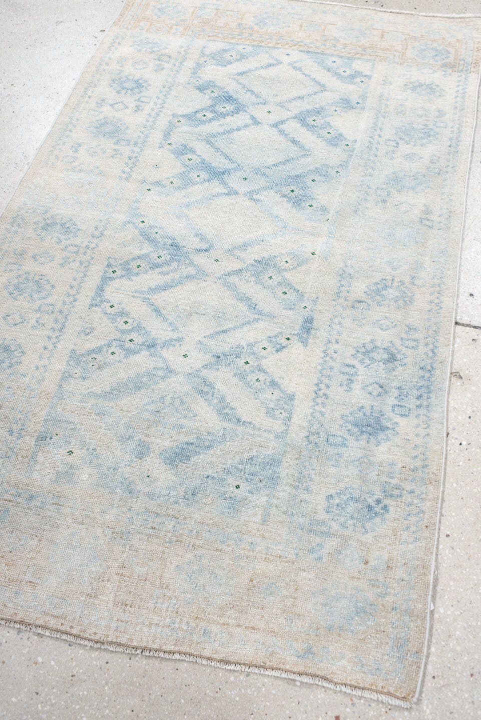 2' x 3' one-of-a-kind handmade vintage Belouch small size rug. Color palette: ivory, pale blue, cream, beige, sage