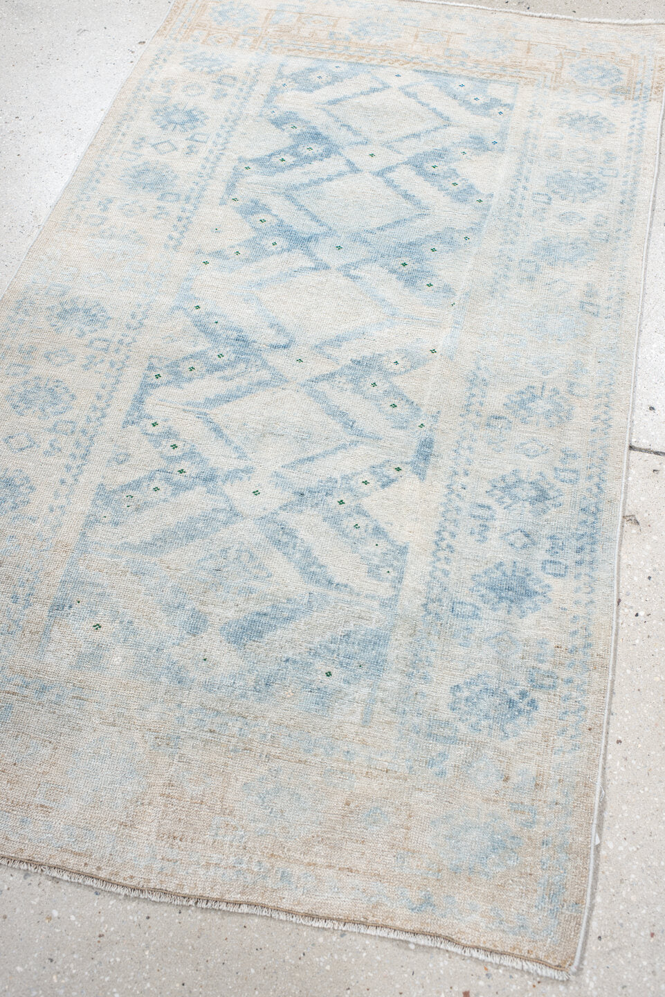 2' x 3' one-of-a-kind handmade vintage Belouch small size rug. Color palette: ivory, pale blue, cream, beige, sage