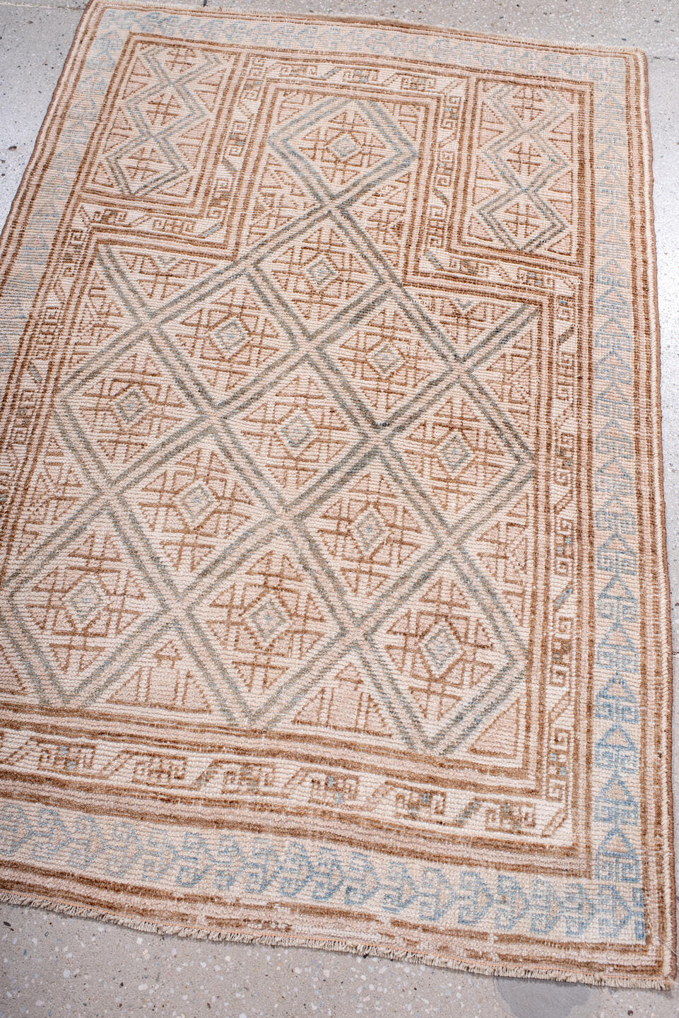 3' x 4' one-of-a-kind handmade antique Belouch small size rug. Color palette: ivory, camel, pale blue, taupe, sand, beige