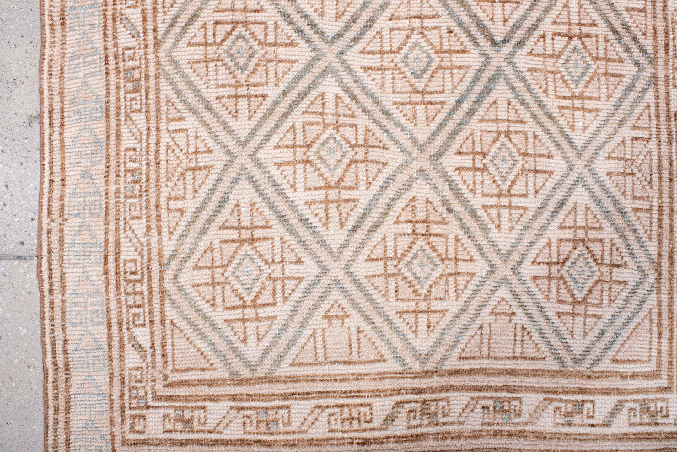 3' x 4' one-of-a-kind handmade antique Belouch small size rug. Color palette: ivory, camel, pale blue, taupe, sand, beige
