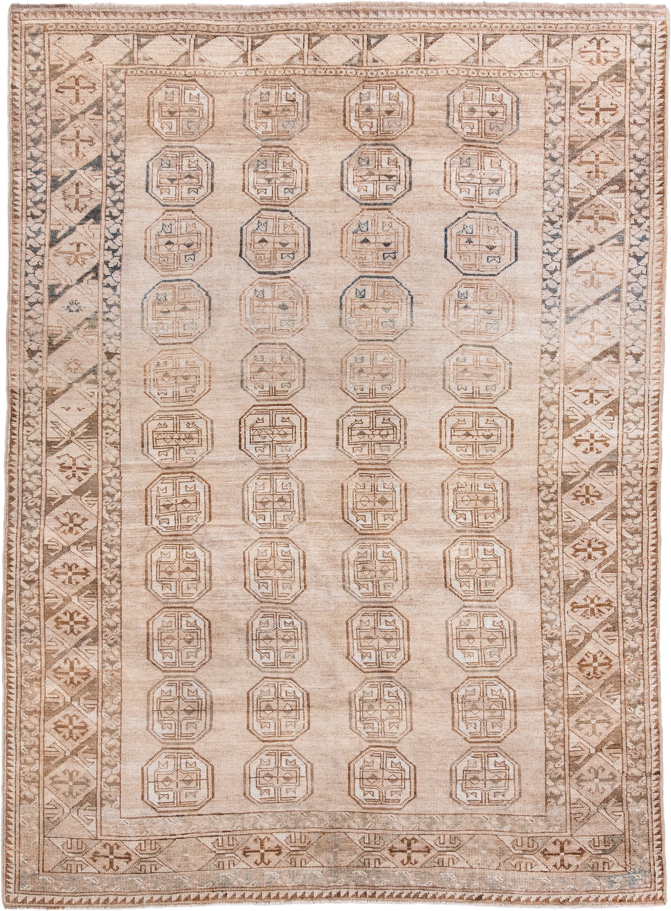 5' x 7' one-of-a-kind handmade antique Afghan rug. Color palette: ivory, taupe, camel, sand, brown, slate, beige, gray