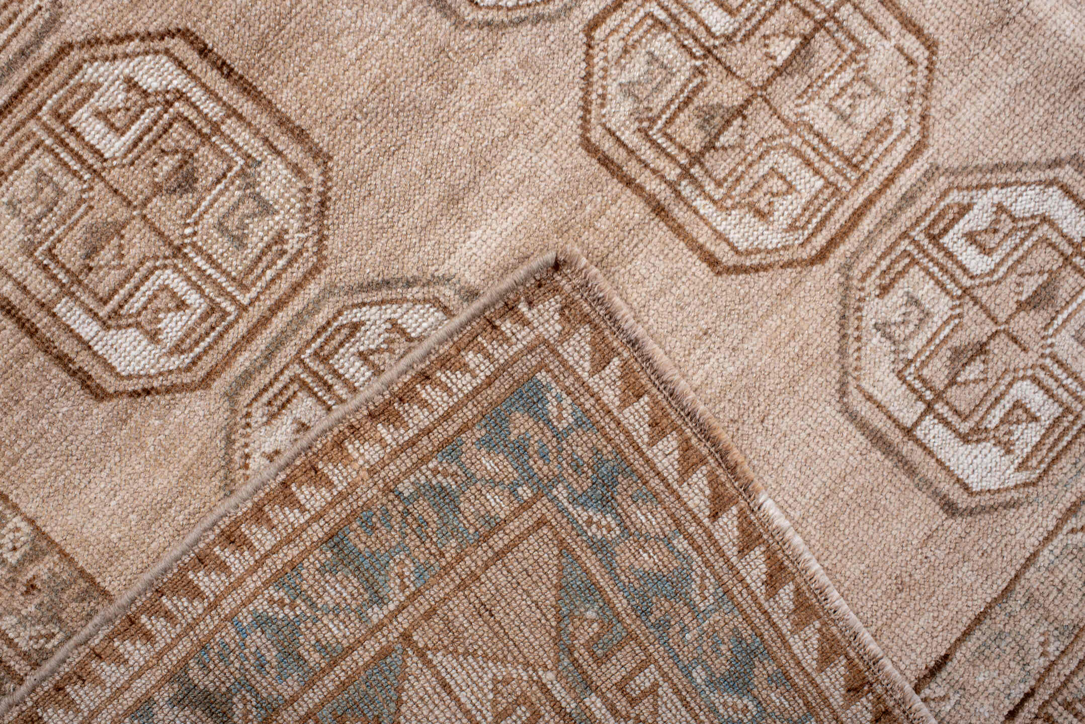 5' x 7' one-of-a-kind handmade antique Afghan rug. Color palette: ivory, taupe, camel, sand, brown, slate, beige, gray
