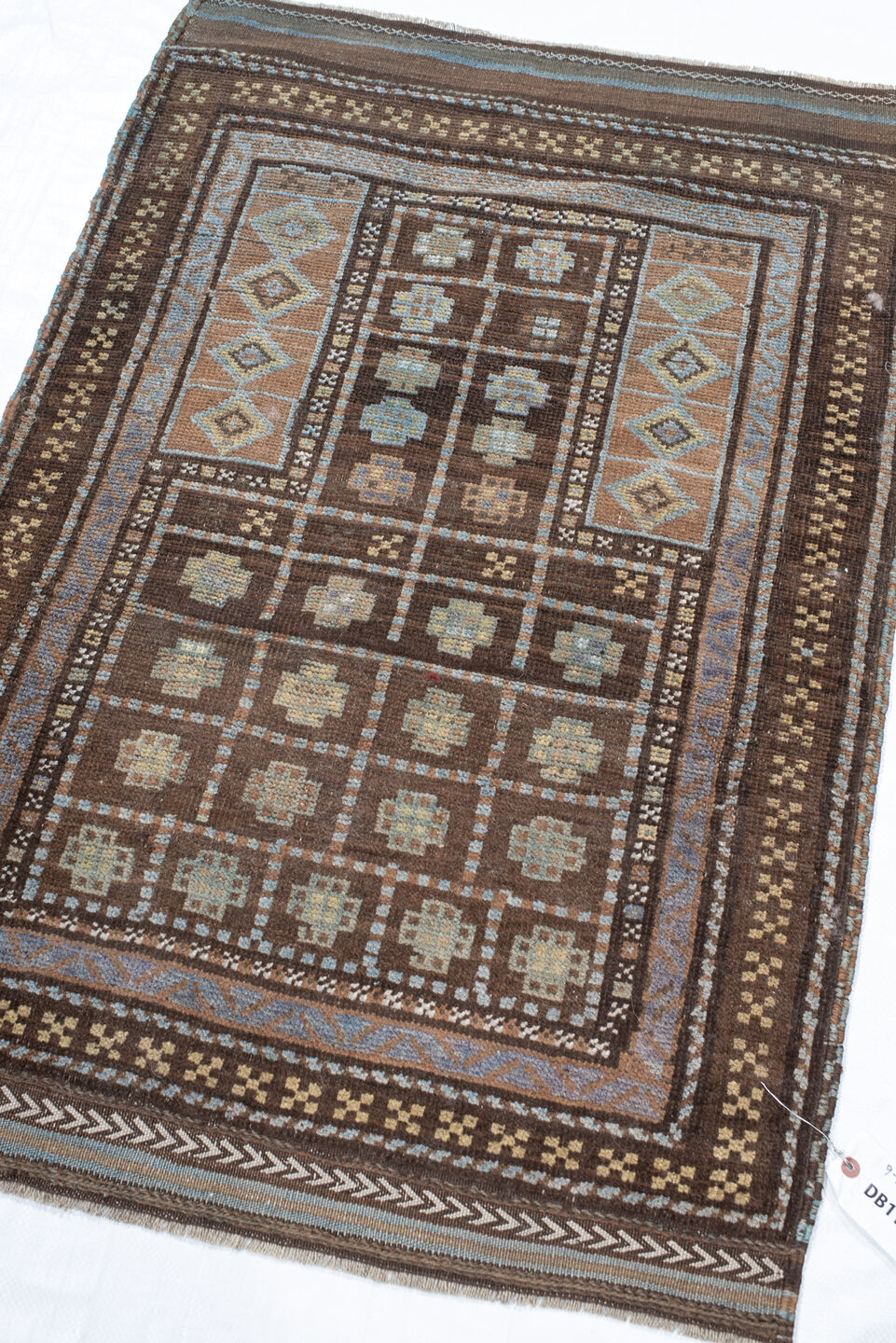 2' x 4' one-of-a-kind handmade vintage Belouch small size rug. Color palette: antiquewhite, blanched almond, brown