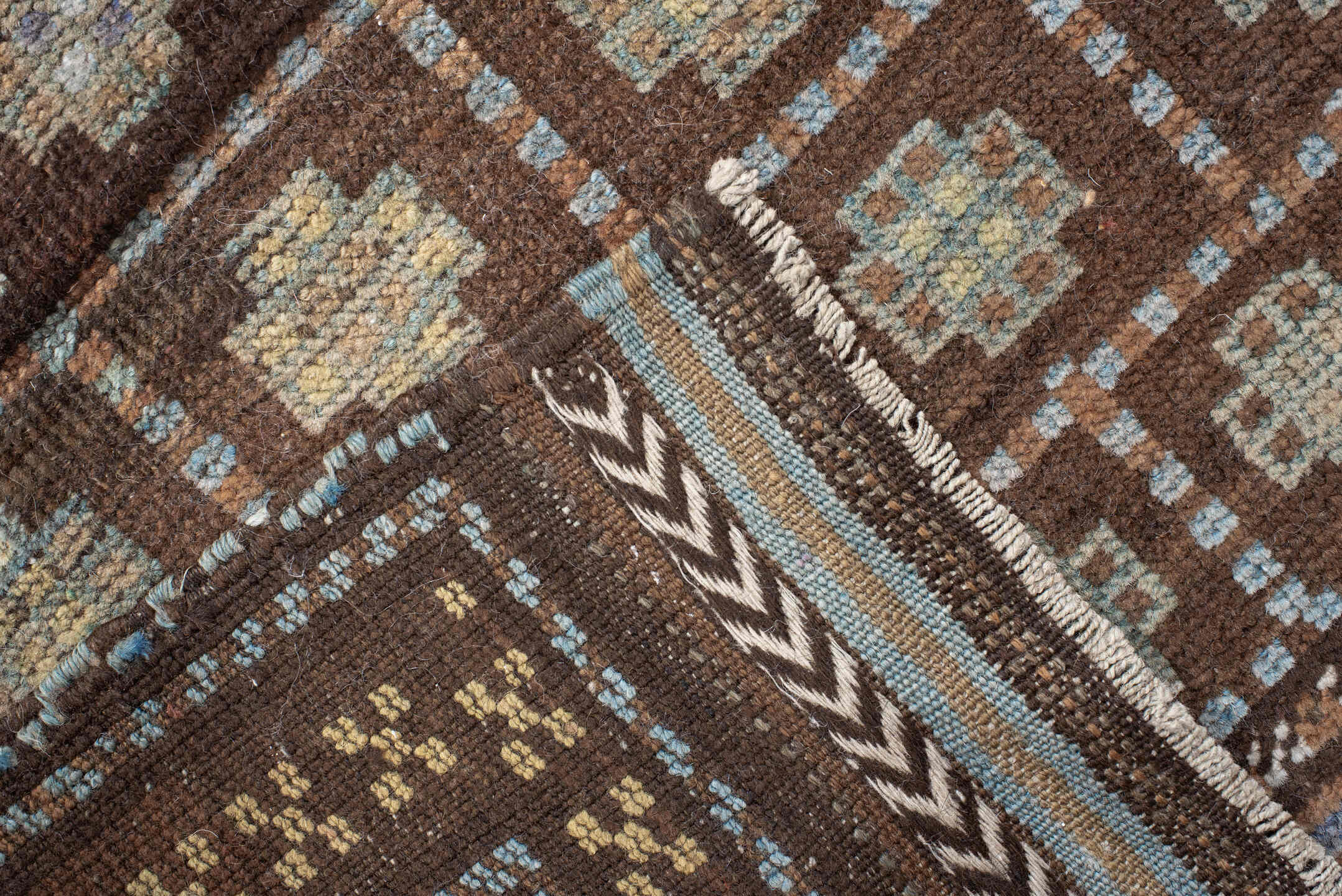 2' x 4' one-of-a-kind handmade vintage Belouch small size rug. Color palette: antiquewhite, blanched almond, brown