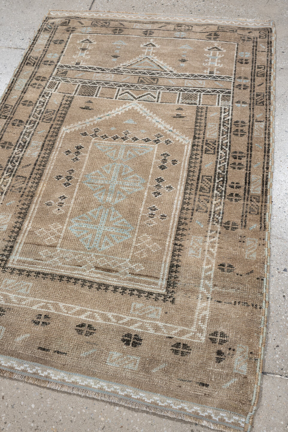 2' x 3' one-of-a-kind handmade antique Belouch small size rug. Color palette: camel, ivory, pale blue, charcoal, taupe
