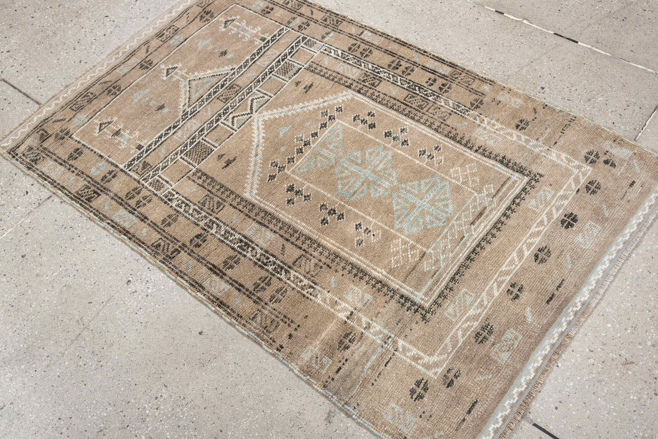 2' x 3' one-of-a-kind handmade antique Belouch small size rug. Color palette: camel, ivory, pale blue, charcoal, taupe