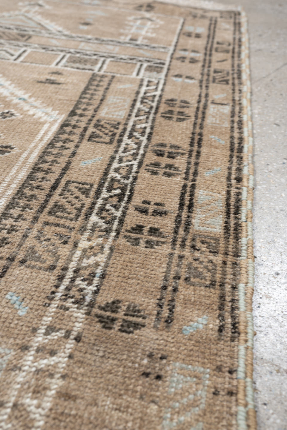 2' x 3' one-of-a-kind handmade antique Belouch small size rug. Color palette: camel, ivory, pale blue, charcoal, taupe