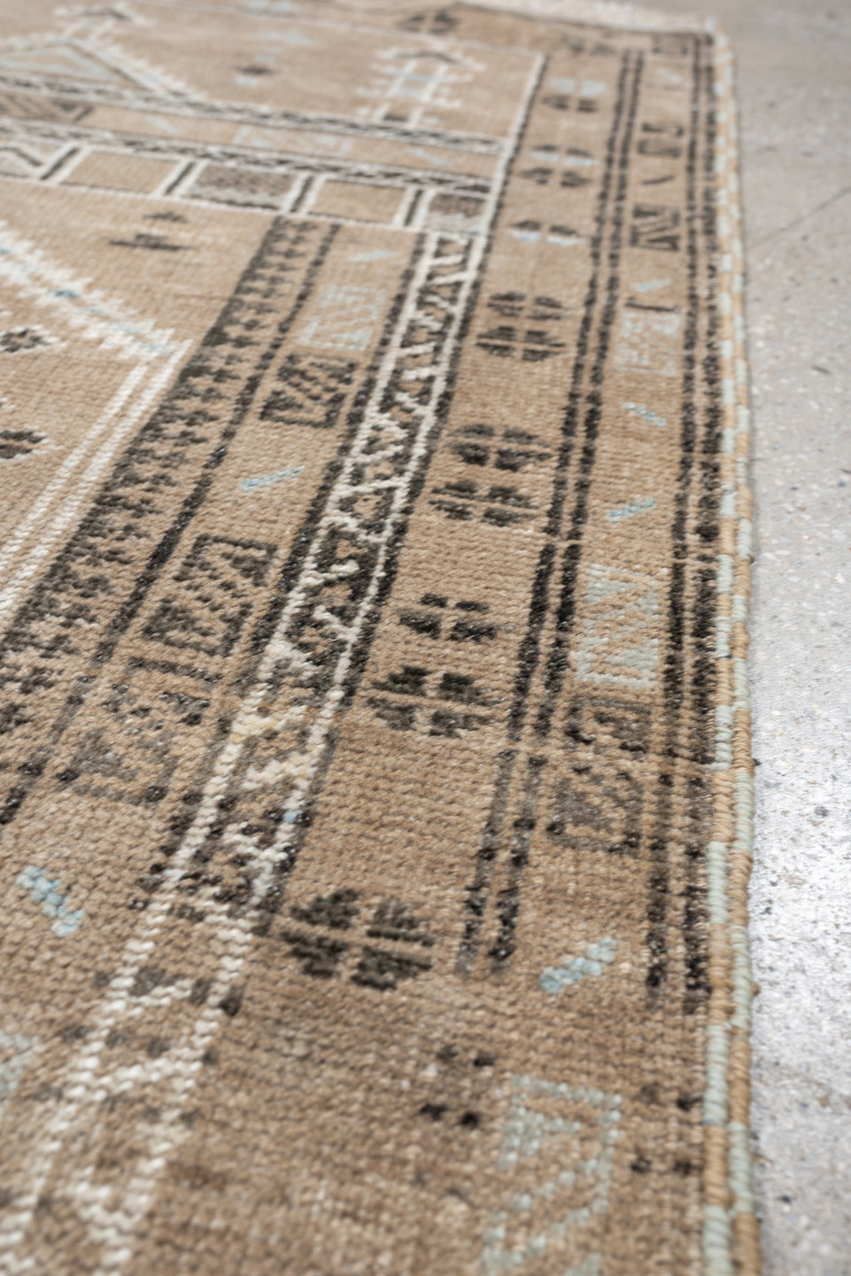 2' x 3' one-of-a-kind handmade antique Belouch small size rug. Color palette: camel, ivory, pale blue, charcoal, taupe