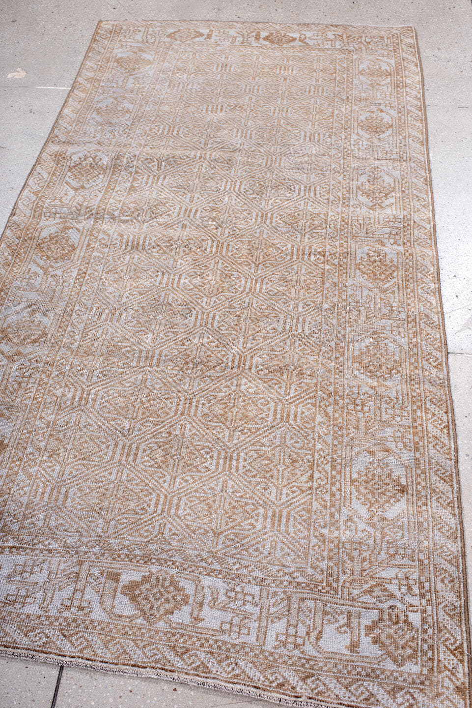 3' x 7' one-of-a-kind handmade antique Belouch rug. Color palette: ivory, camel, tan, taupe, beige, gray