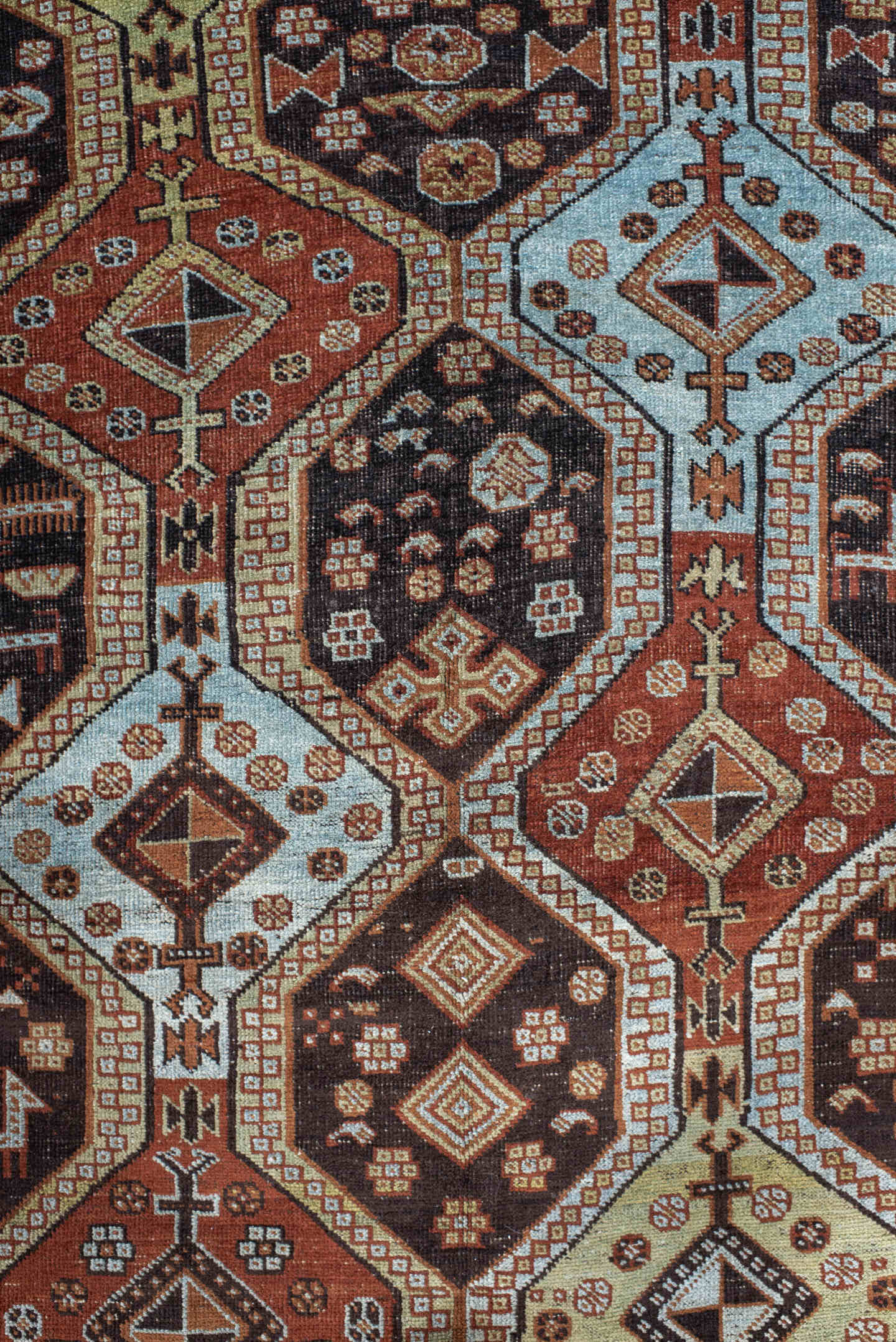 4' x 6' one-of-a-kind handmade antique Belouch small size rug. Color palette: rust, ivory, dark brown, sky blue, sage