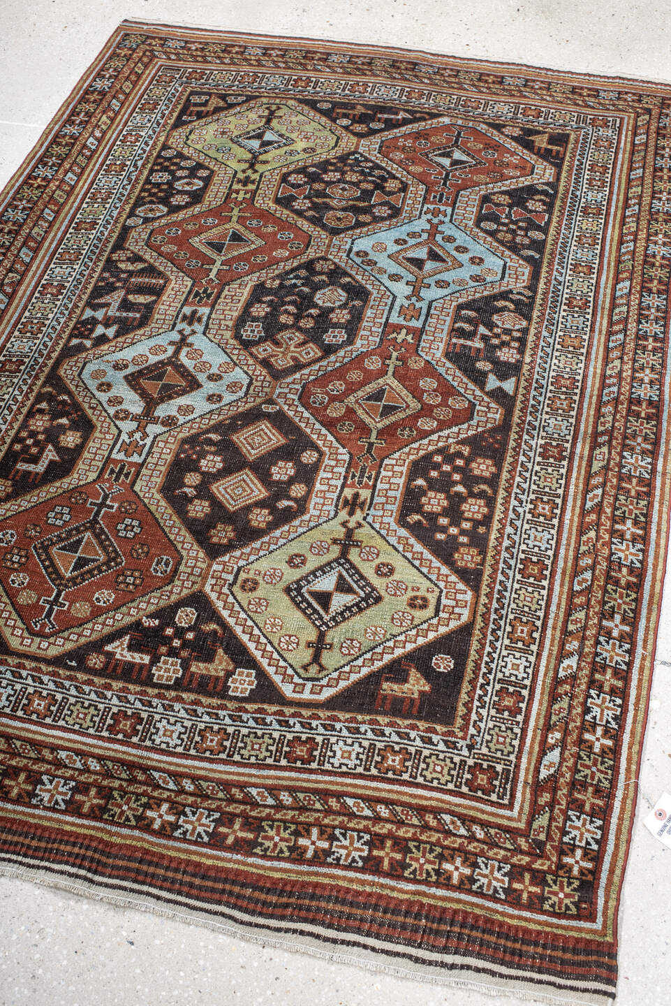4' x 6' one-of-a-kind handmade antique Belouch small size rug. Color palette: rust, ivory, dark brown, sky blue, sage