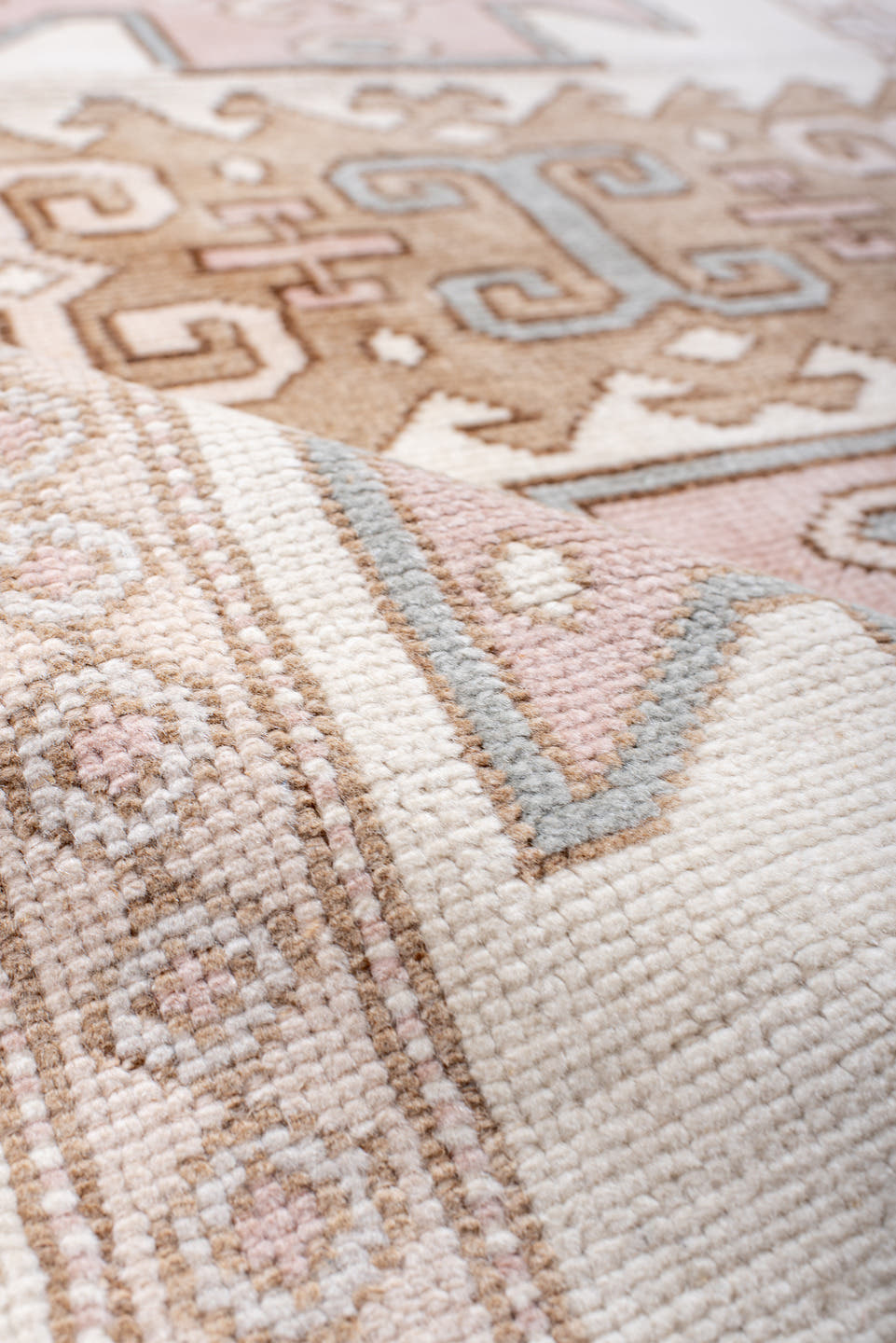4' x 5' one-of-a-kind handmade vintage Anatolian small size rug. Color palette: ivory, blush, taupe, camel, pale blue, pink