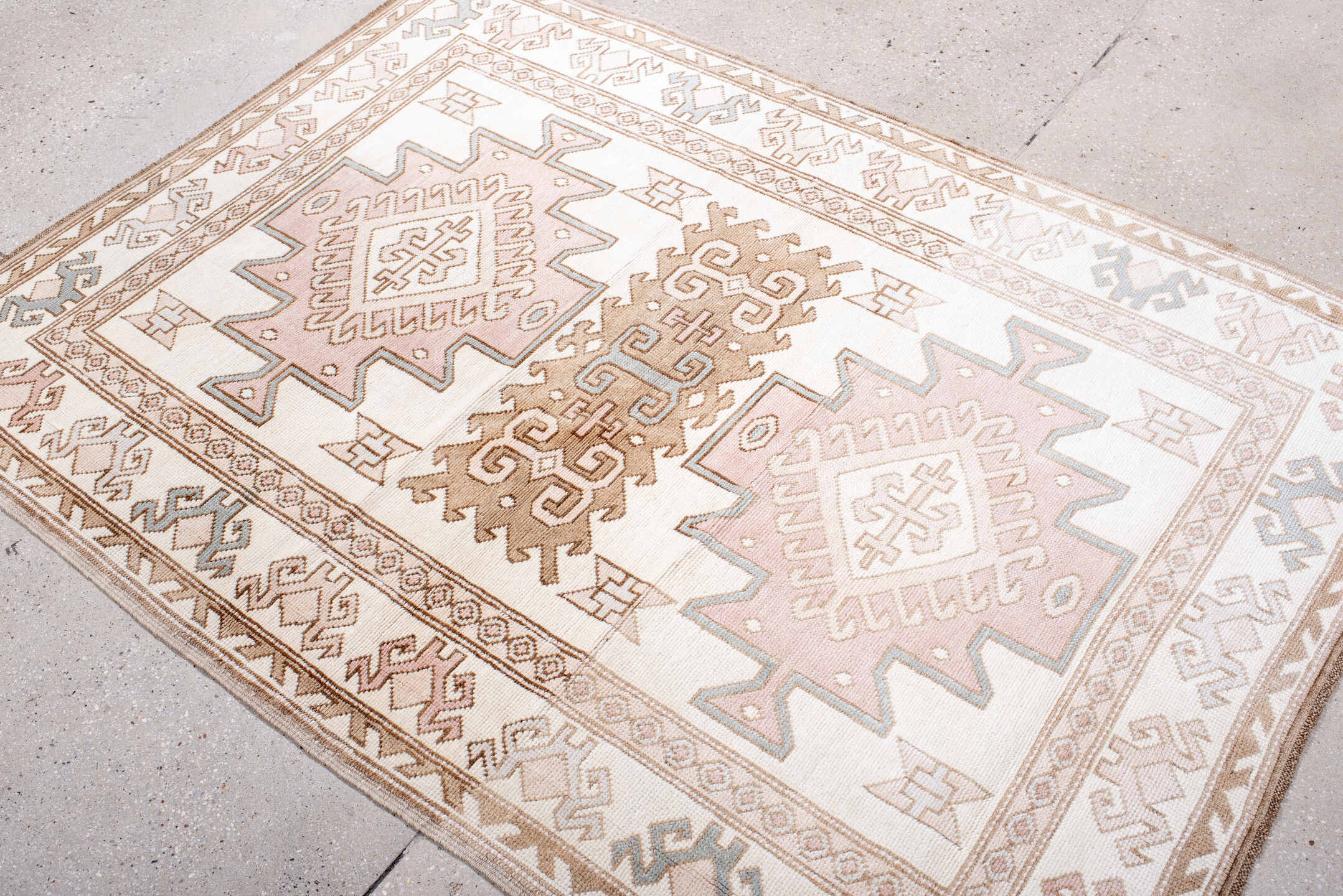 4' x 5' one-of-a-kind handmade vintage Anatolian small size rug. Color palette: ivory, blush, taupe, camel, pale blue, pink