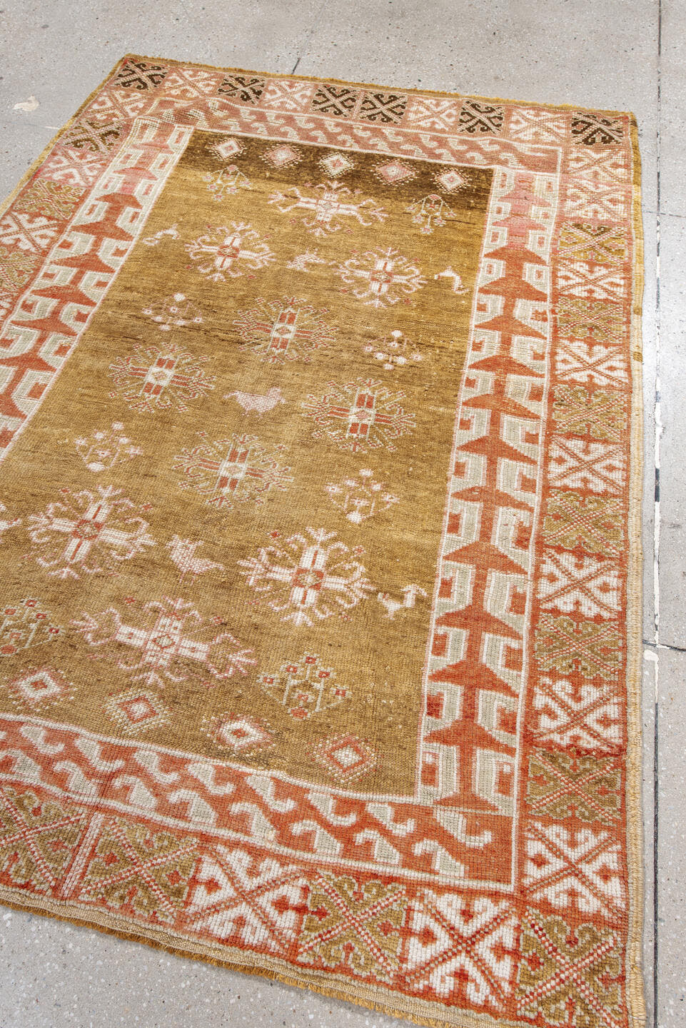 4' x 6' one-of-a-kind handmade antique Anatolian rug. Color palette: camel, ivory, terra cotta, olive, brown, rose, beige