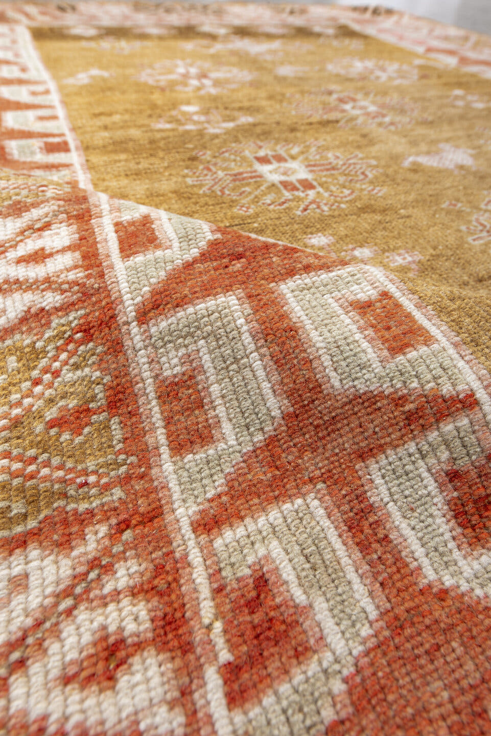 4' x 6' one-of-a-kind handmade antique Anatolian rug. Color palette: camel, ivory, terra cotta, olive, brown, rose, beige