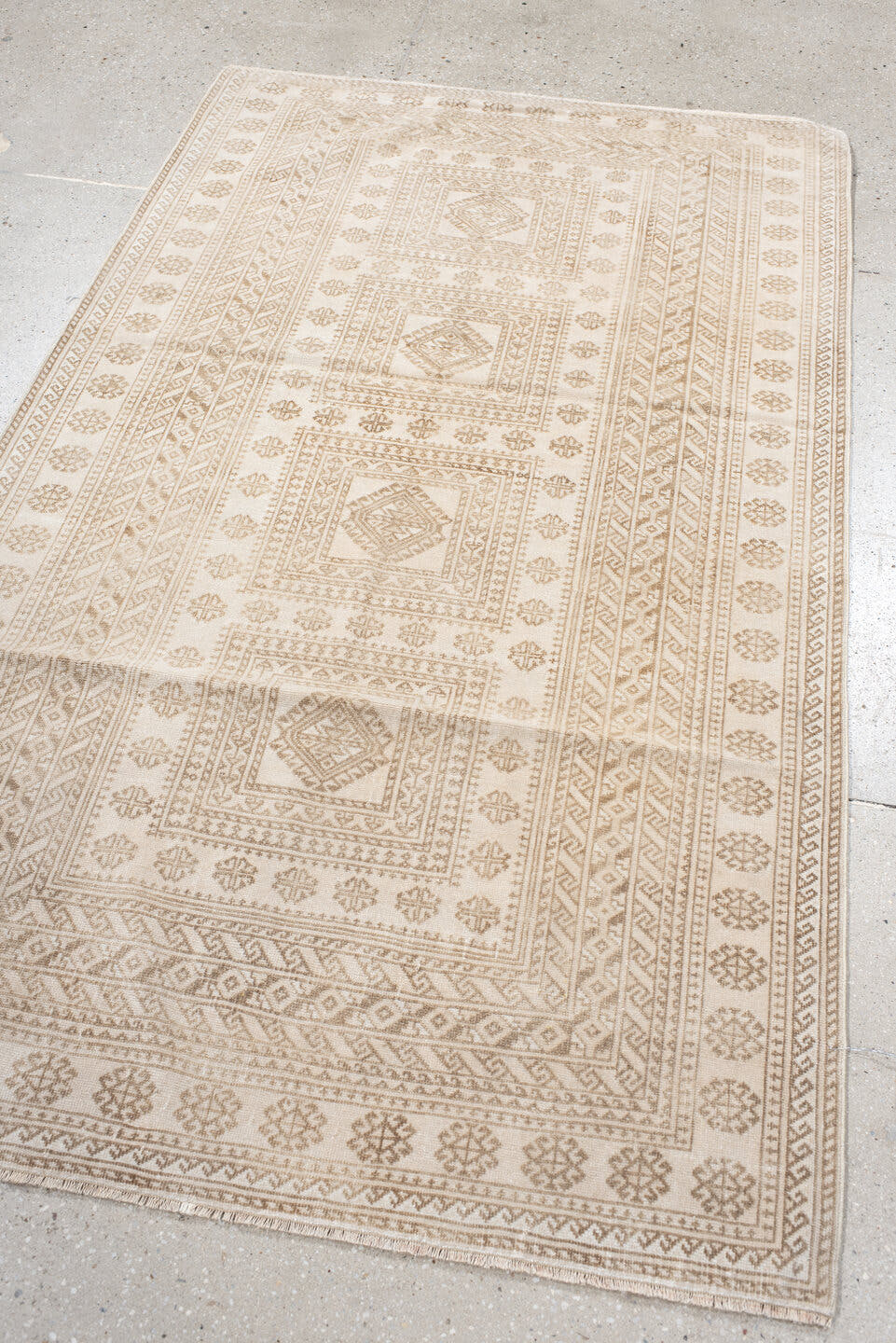 3' x 6' one-of-a-kind handmade vintage Belouch small size rug. Color palette: ivory, camel, taupe, beige, gray