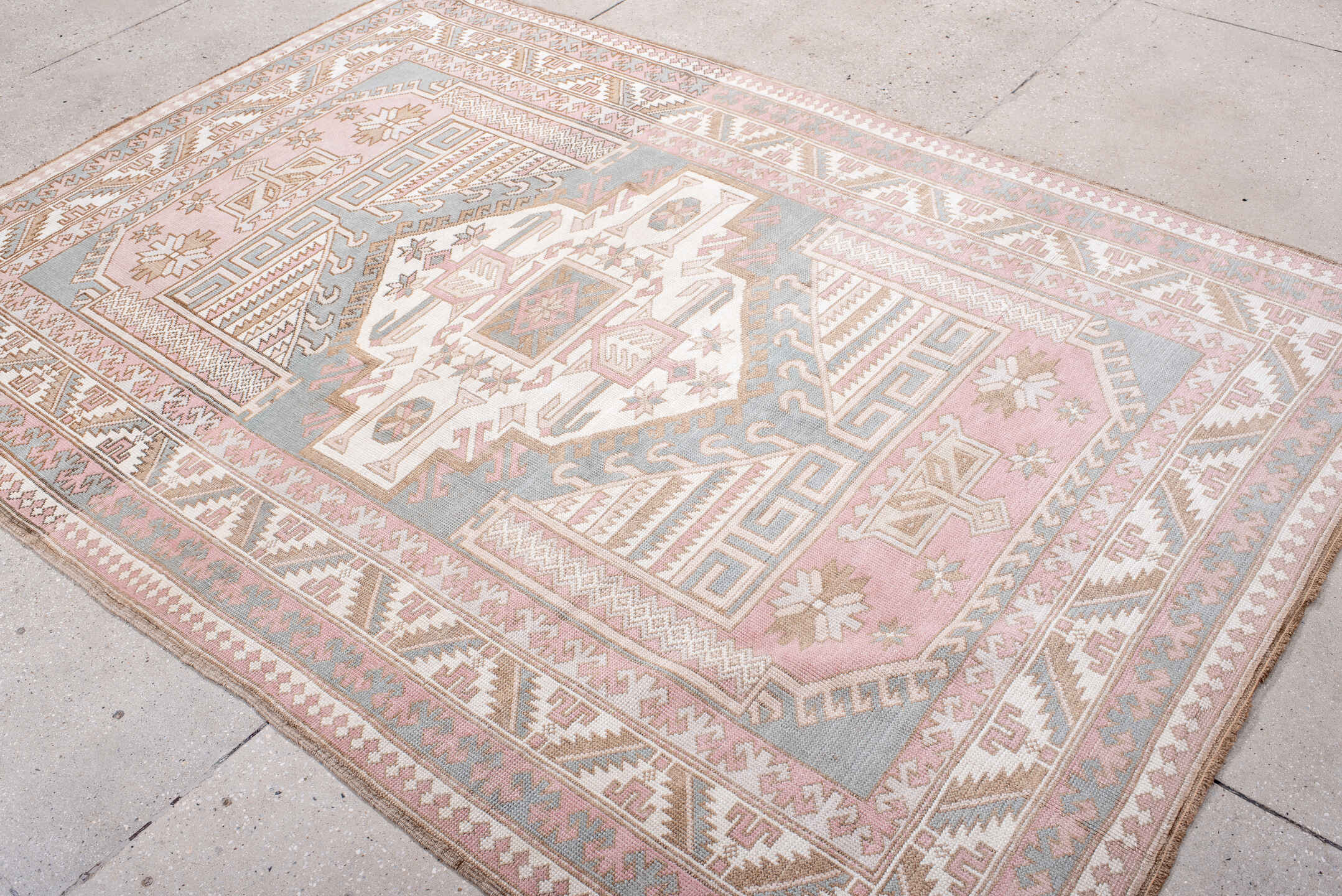 5' x 8' one-of-a-kind handmade antique Oushak medium size rug. Color palette: blush, ivory, pale blue, taupe, sand, rose