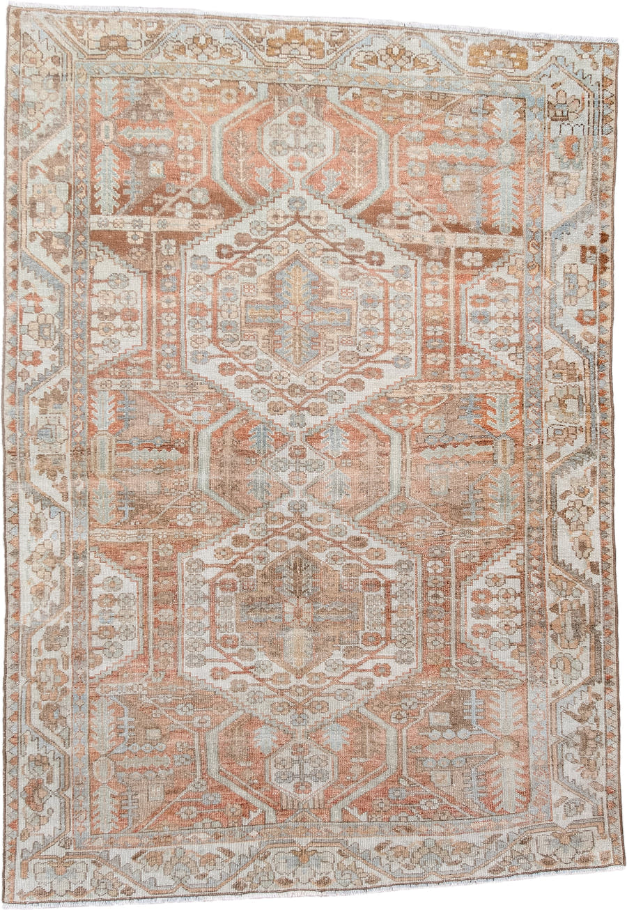4' x 6' one-of-a-kind handmade antique Baktiary rug. Color palette: ivory, camel, rust, taupe, pale blue, terra cotta, beige