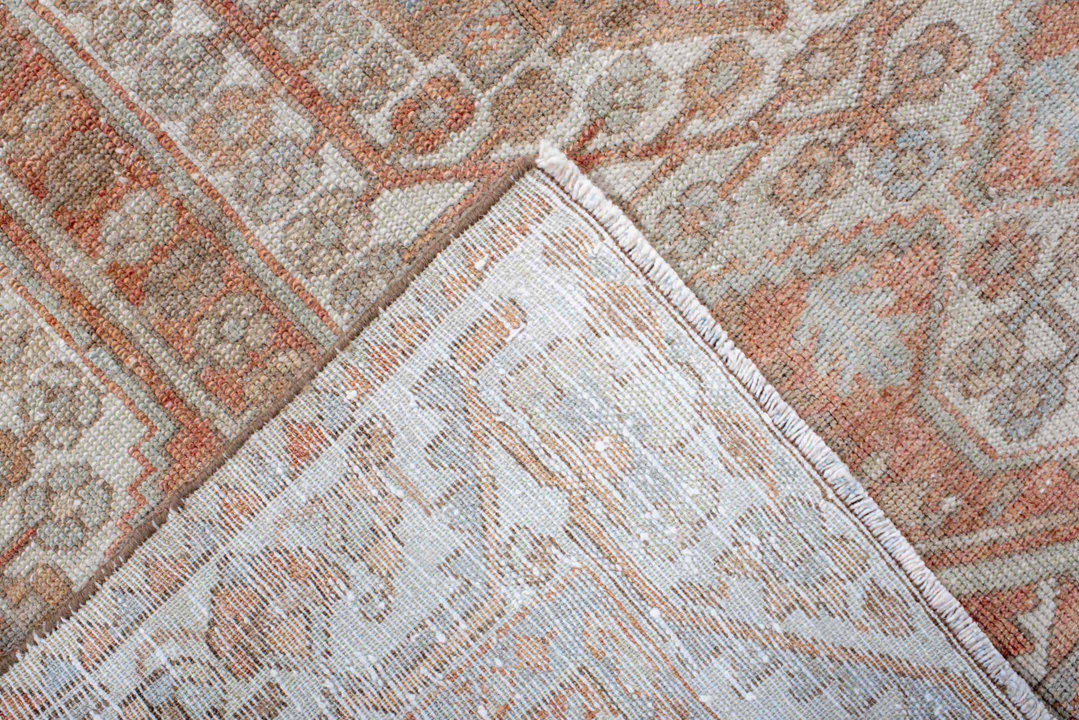 4' x 6' one-of-a-kind handmade antique Baktiary rug. Color palette: ivory, camel, rust, taupe, pale blue, terra cotta, beige