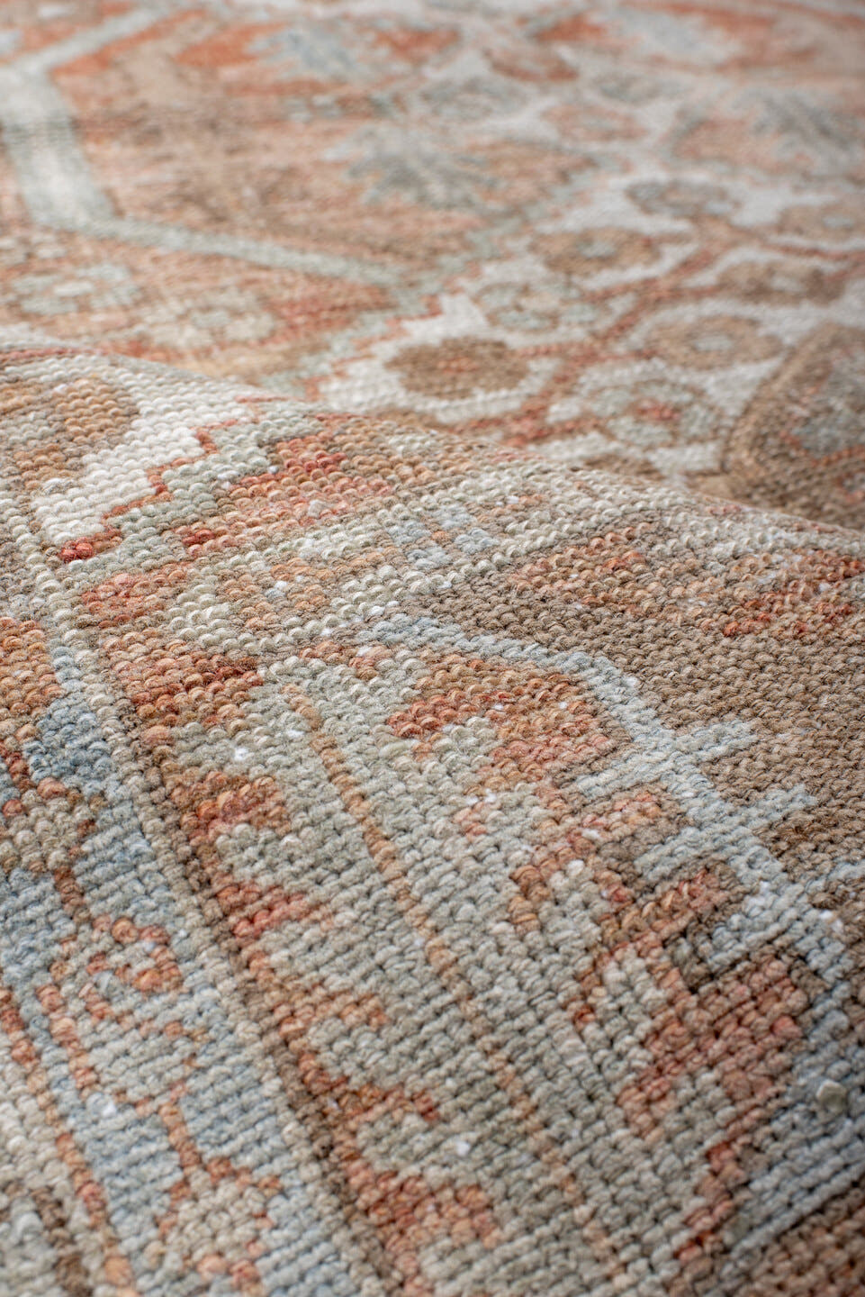 4' x 6' one-of-a-kind handmade antique Baktiary rug. Color palette: ivory, camel, rust, taupe, pale blue, terra cotta, beige