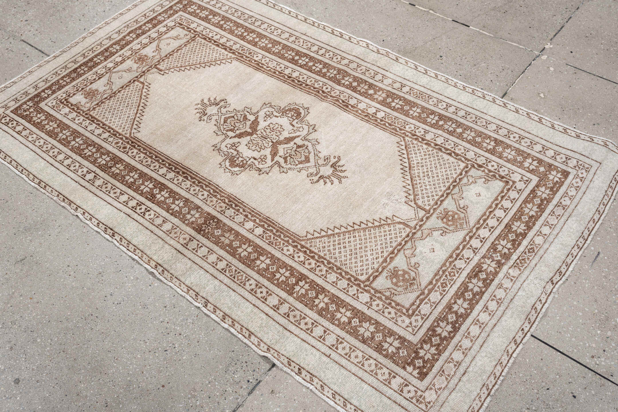 3' x 5' one-of-a-kind handmade antique Anatolian small size rug. Color palette: ivory, camel, taupe, beige, gray