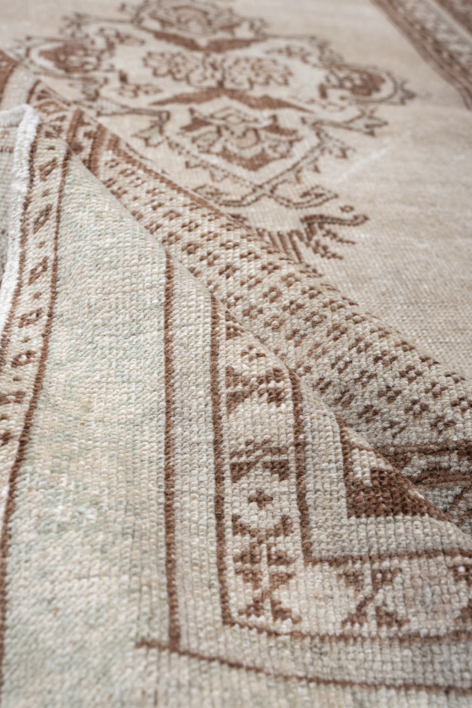 3' x 5' one-of-a-kind handmade antique Anatolian small size rug. Color palette: ivory, camel, taupe, beige, gray