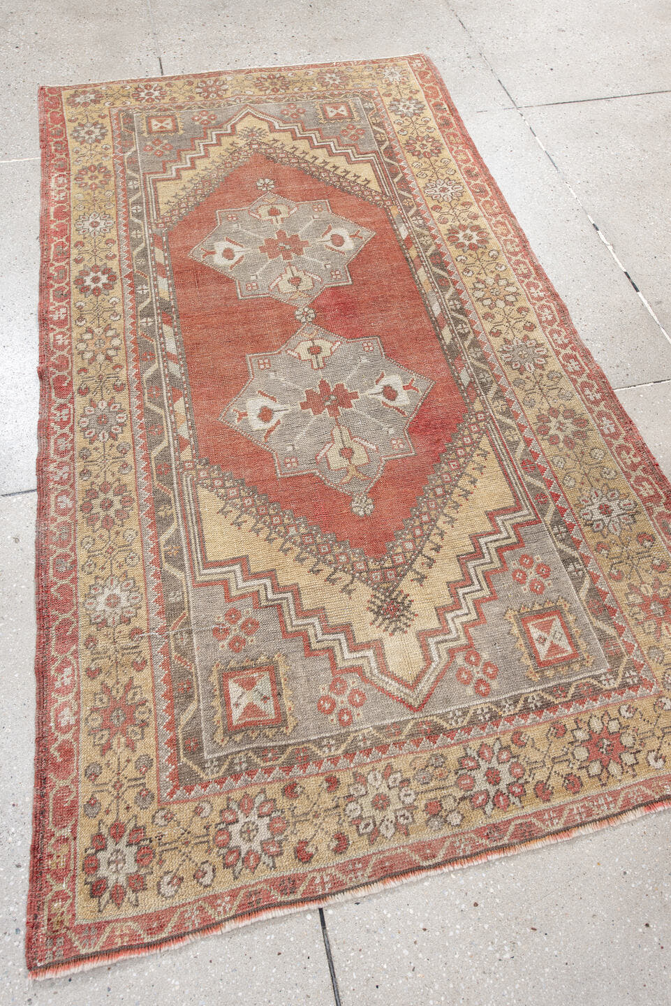 3' x 6' one-of-a-kind handmade antique Anatolian small size rug. Color palette: terra cotta, ivory, gray, rust, taupe, rose