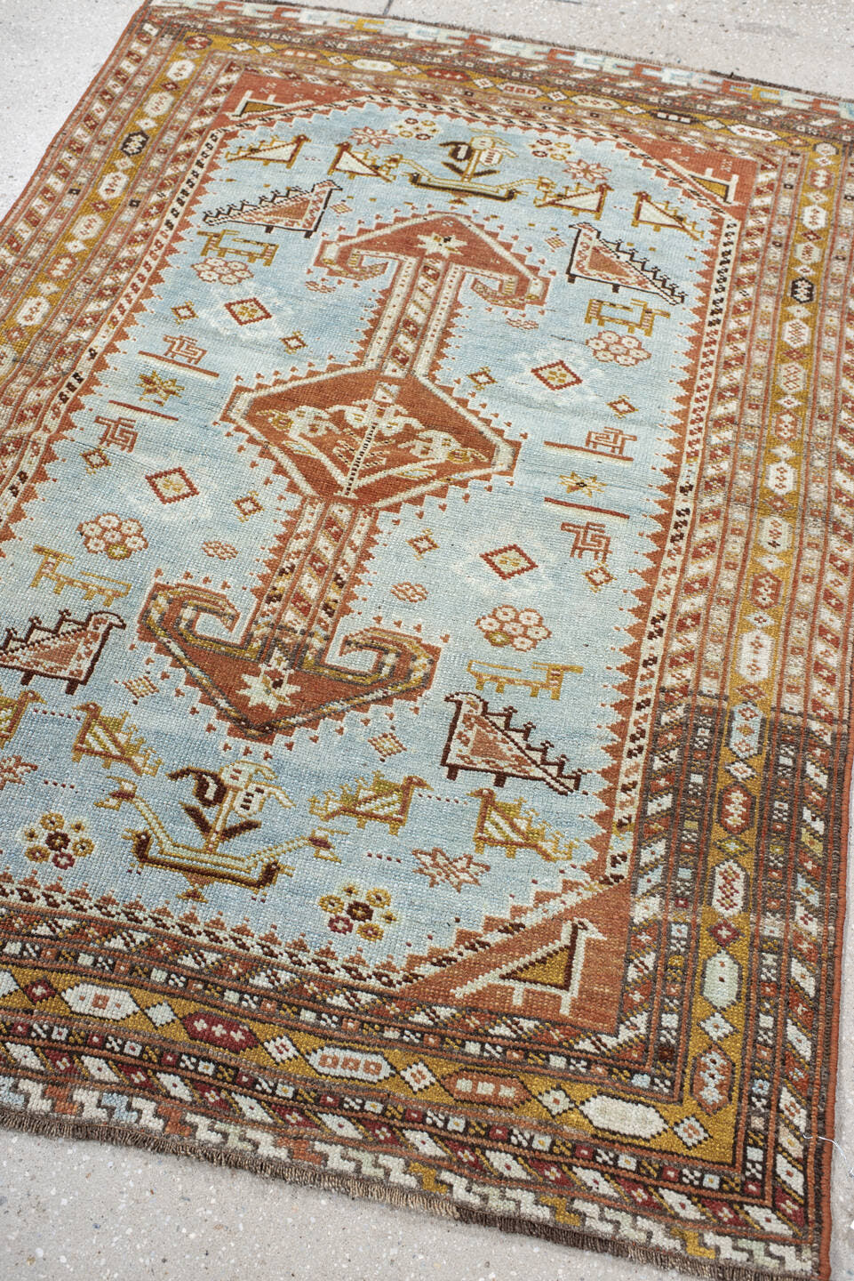 3' x 4' one-of-a-kind handmade antique Shiraz small size rug. Color palette: sky blue, rust, ivory, camel, brown, gold