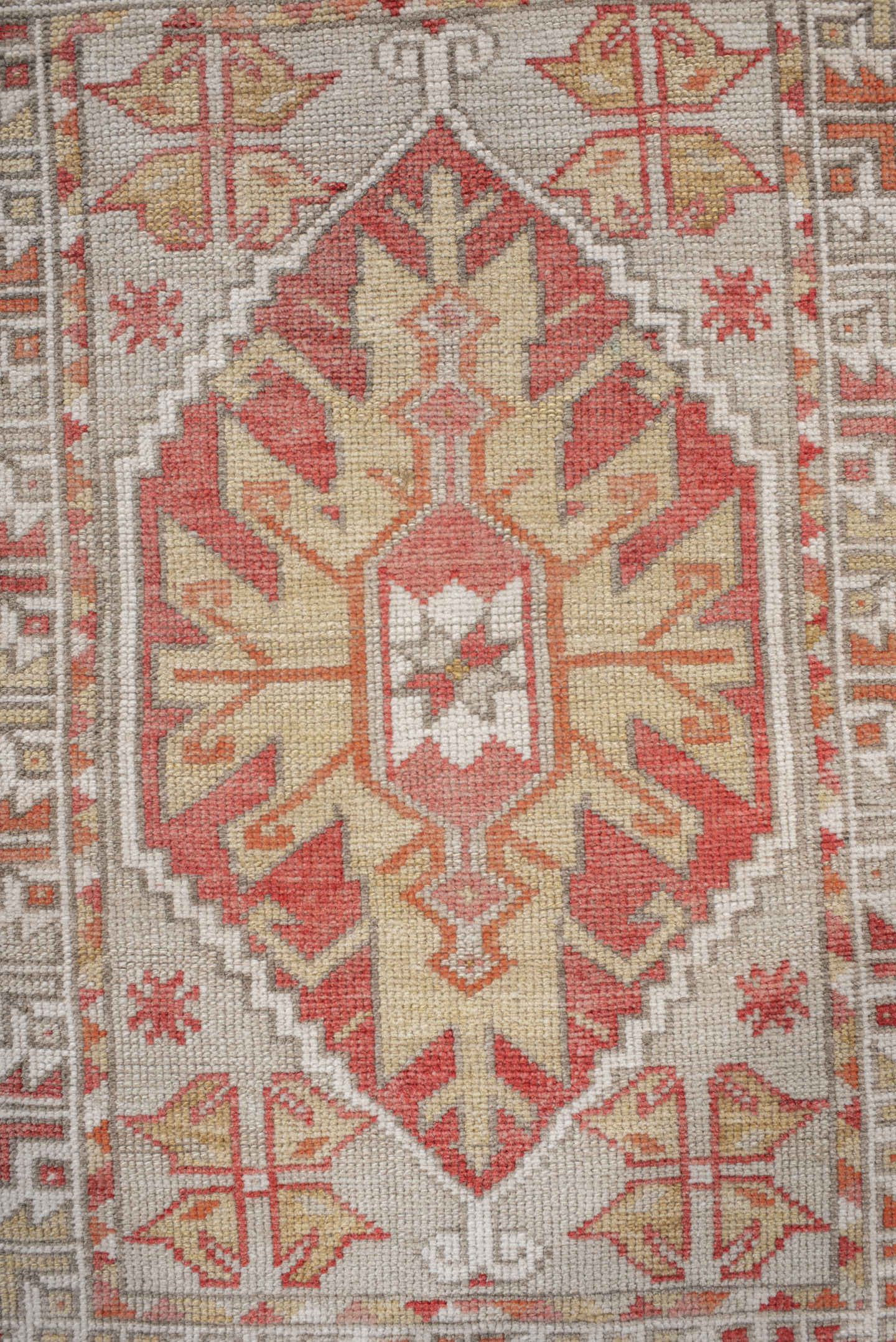 2' x 4' one-of-a-kind handmade vintage Anatolian small size rug. Color palette: ivory, coral, peach, taupe, sand, rust
