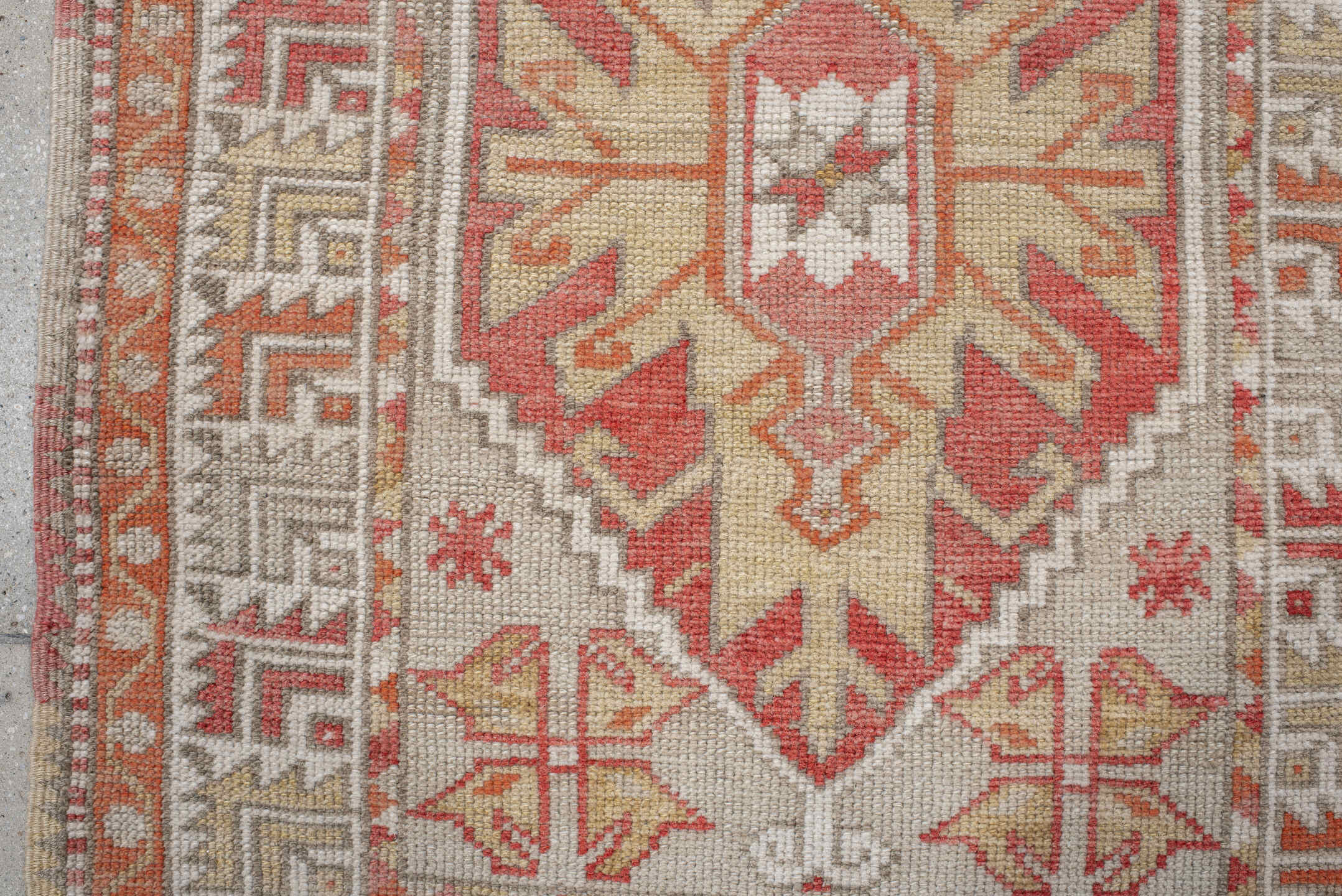 2' x 4' one-of-a-kind handmade vintage Anatolian small size rug. Color palette: ivory, coral, peach, taupe, sand, rust