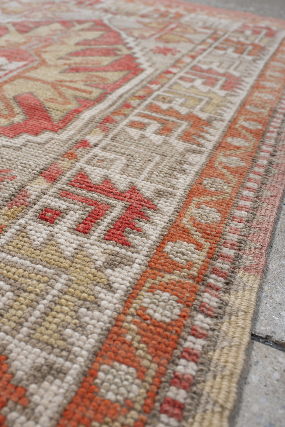 2' x 4' one-of-a-kind handmade vintage Anatolian small size rug. Color palette: ivory, coral, peach, taupe, sand, rust