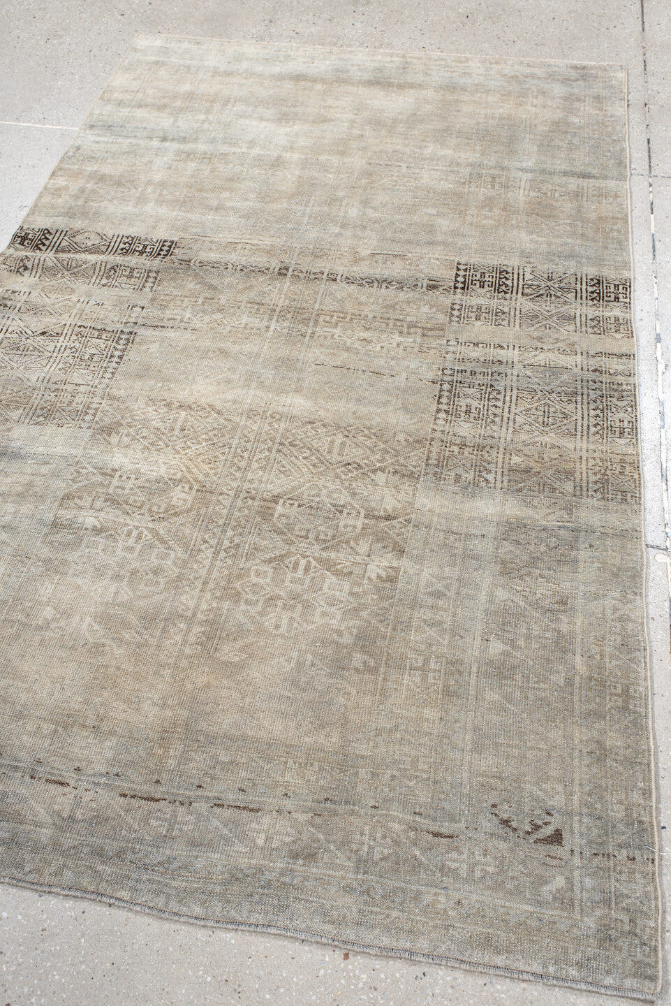 4' x 6' one-of-a-kind handmade antique Belouch small size rug. Color palette: ivory, taupe, beige, brown, greige, charcoal