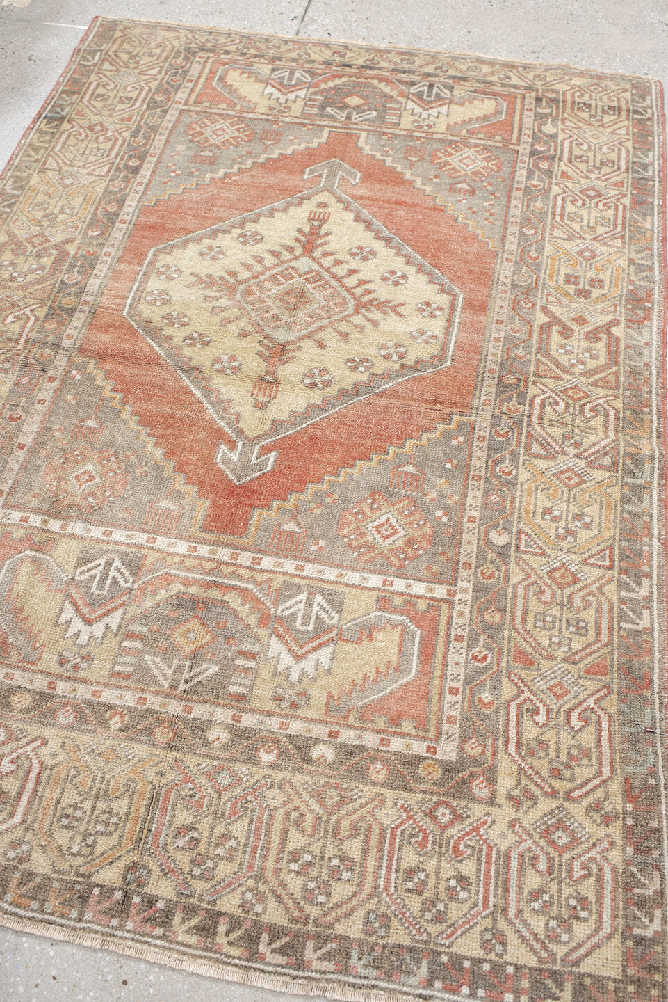 3' x 5' one-of-a-kind handmade vintage Anatolian small size rug. Color palette: taupe, coral, ivory, rose, gray, camel