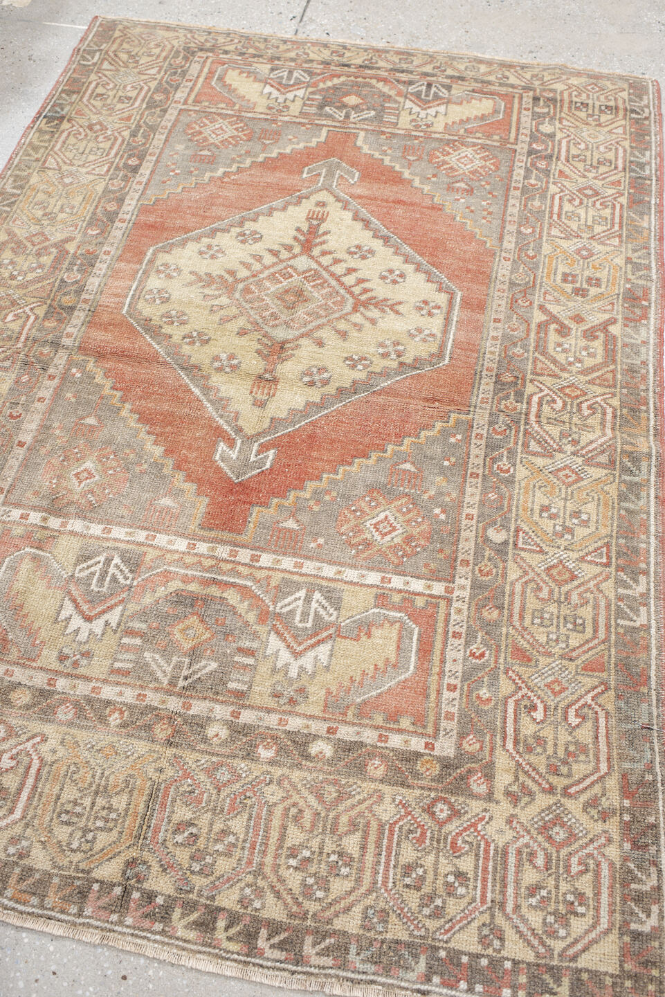 3' x 5' one-of-a-kind handmade vintage Anatolian small size rug. Color palette: taupe, coral, ivory, rose, gray, camel