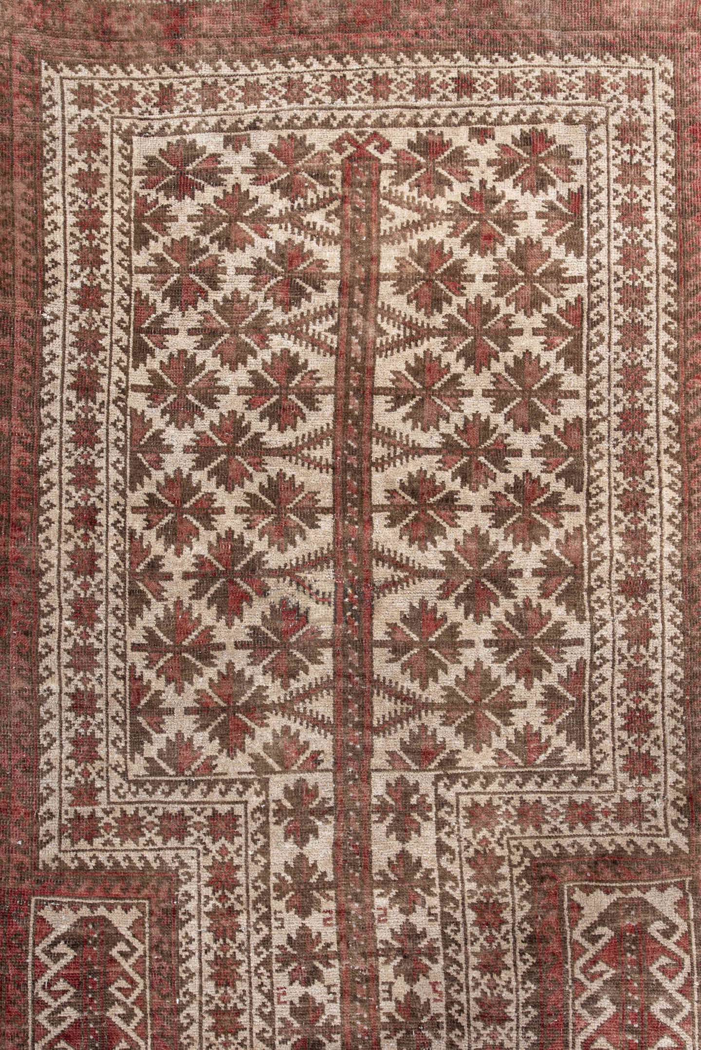 3' x 5' one-of-a-kind handmade antique Belouch small size rug. Color palette: rust, ivory, brown, burgundy, taupe, camel