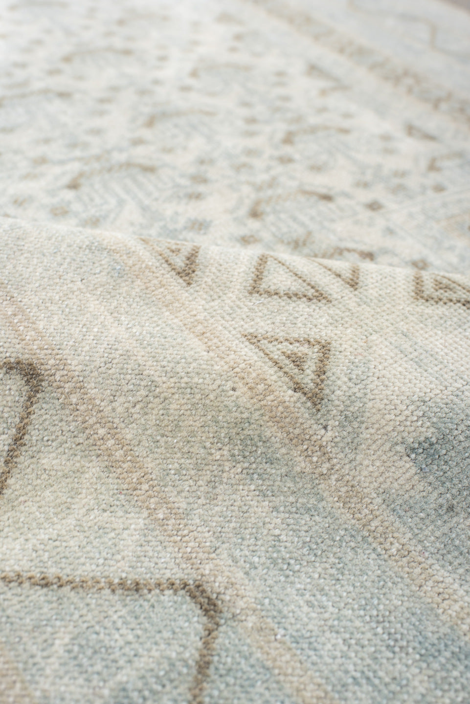 2' x 4' one-of-a-kind handmade vintage Belouch small size rug. Color palette: pale blue, ivory, taupe, light gray